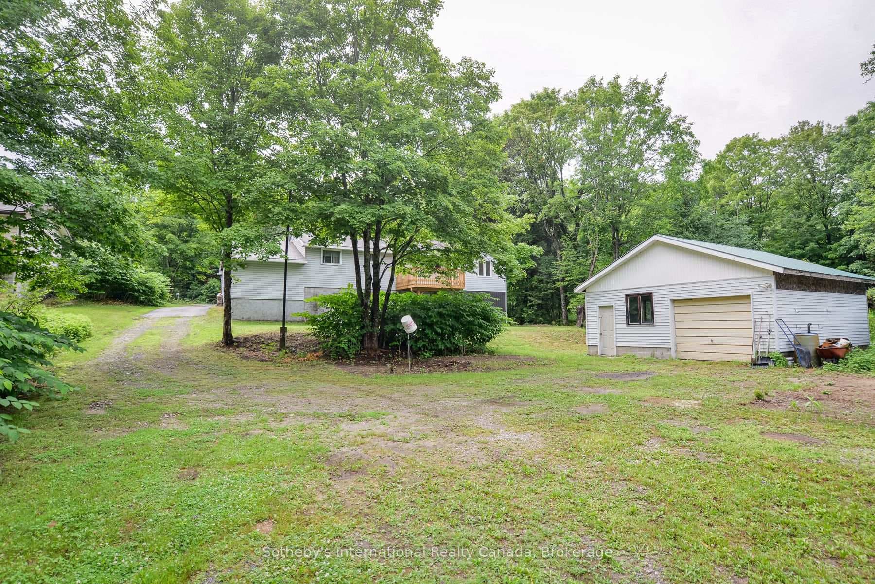 Back of home - big detached garage/workshop.