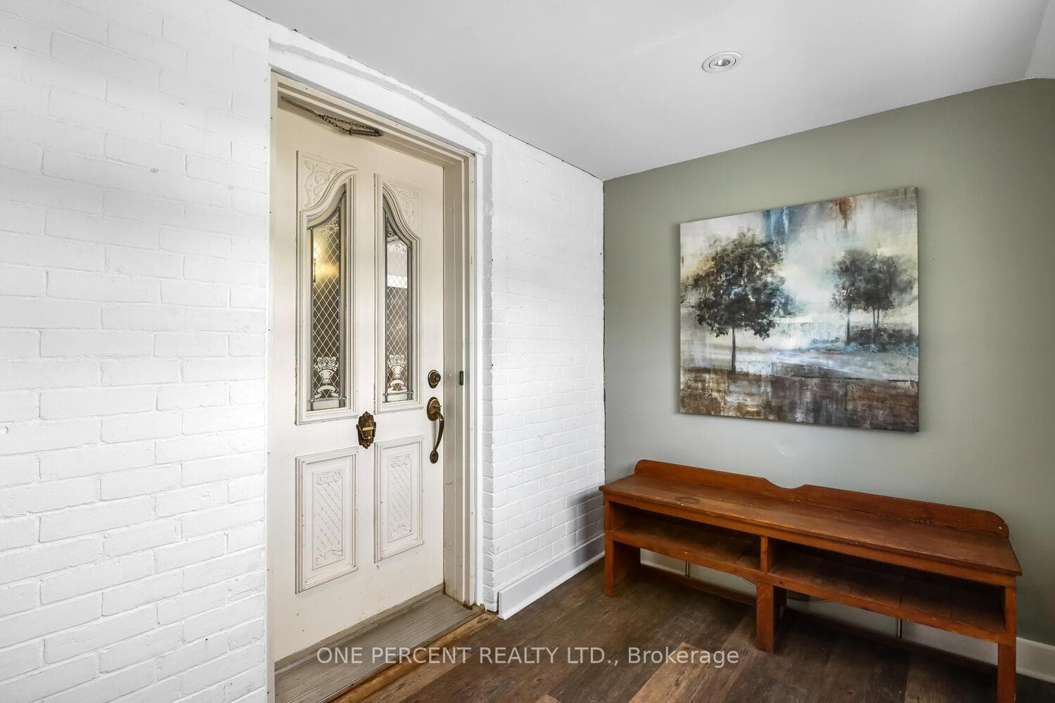 Large foyer/mudroom entering into the home