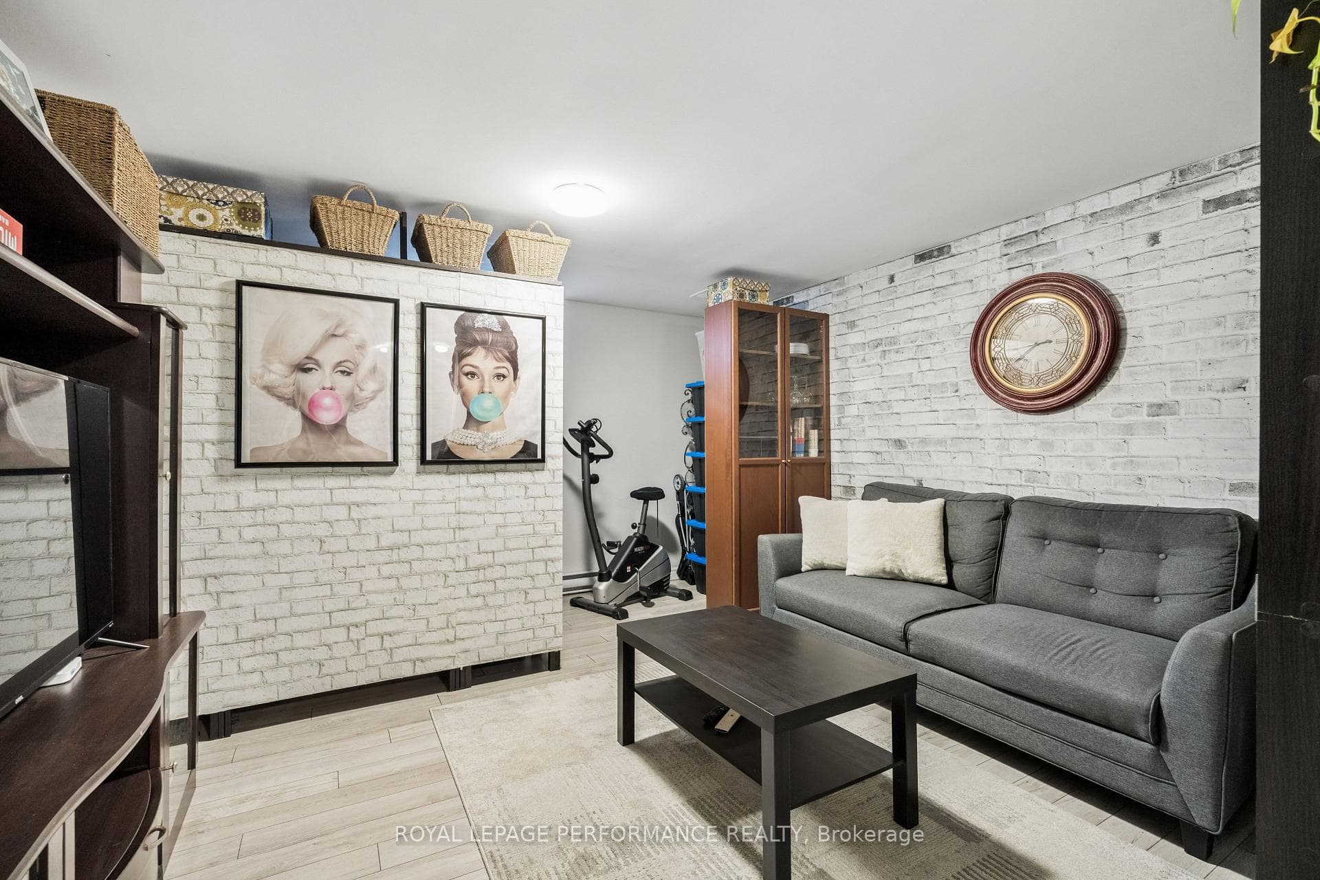 The brick papered wall unit is included.