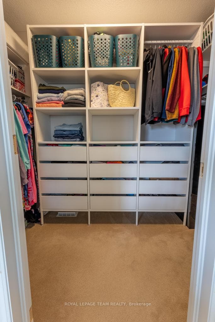 WI closet is very functional with great builtins