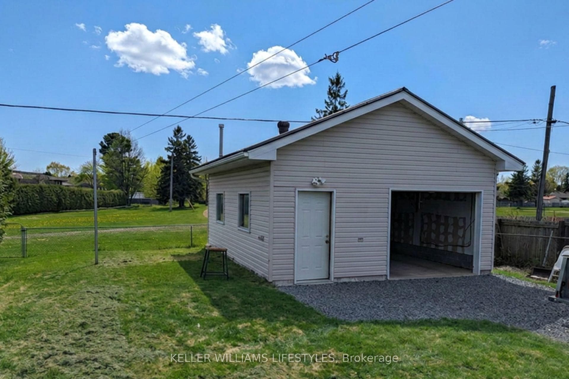 Detached heated Garage. 60 AMP panel, steel roof.