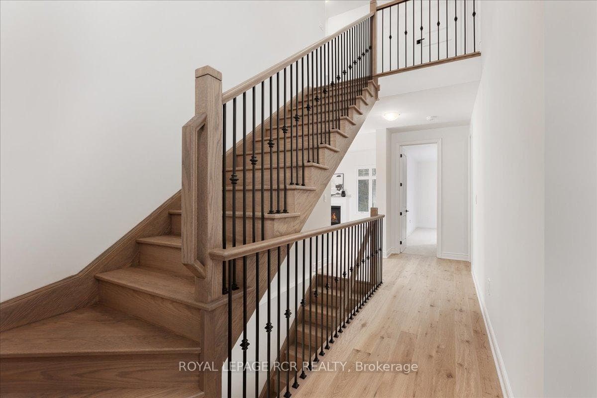 Oak Stairs to Loft with Wrought Iron Pickets