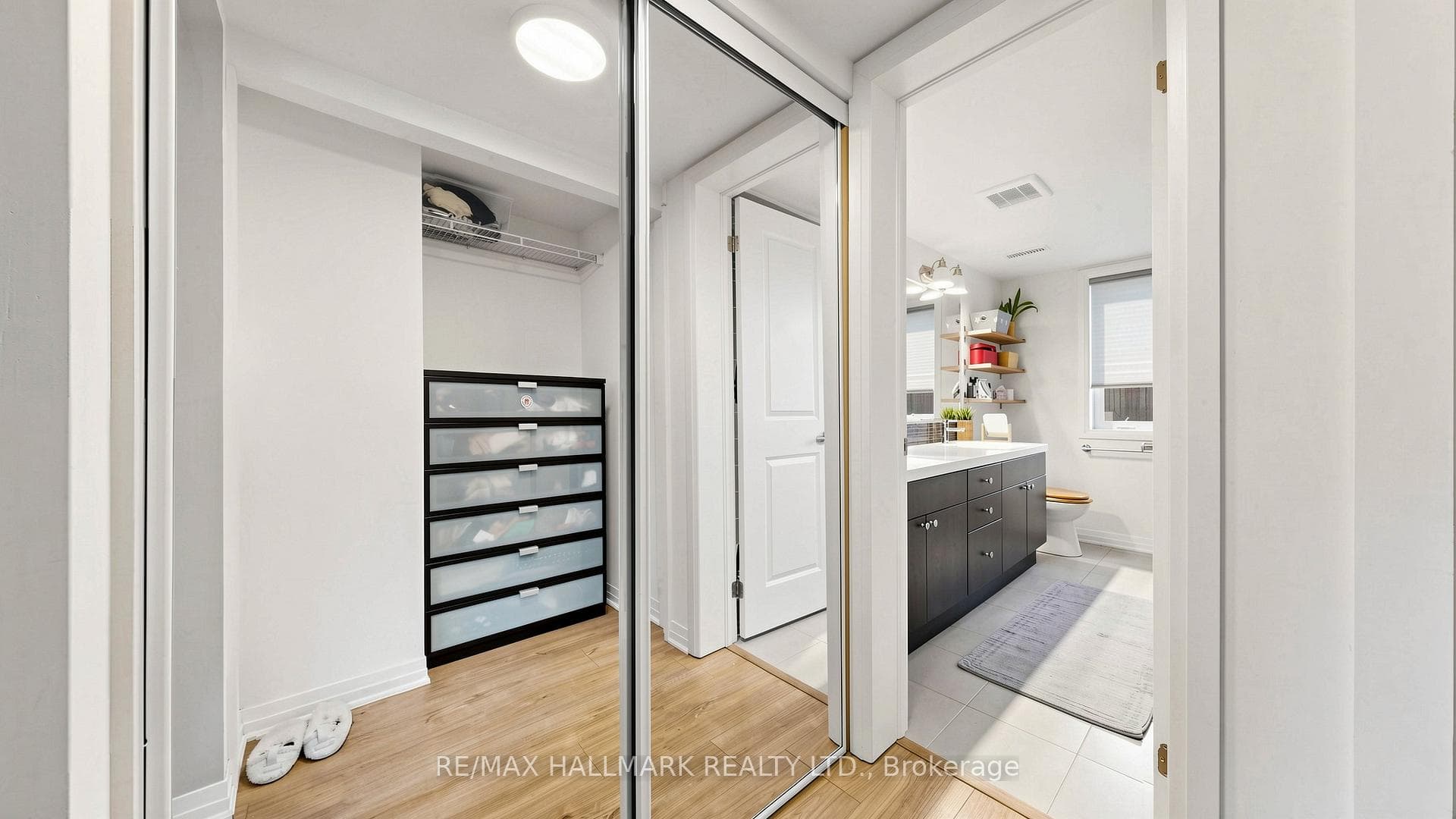 primary walk-through closet to private bathroom