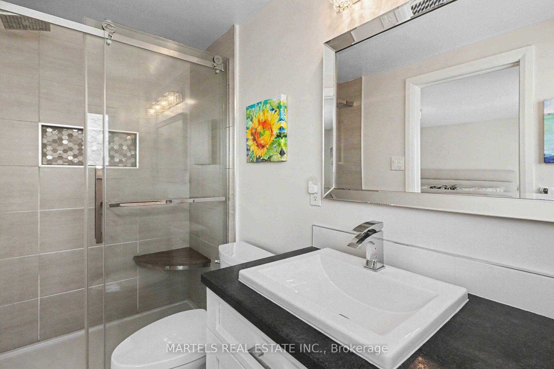 Modernized ensuite with glass shower..
