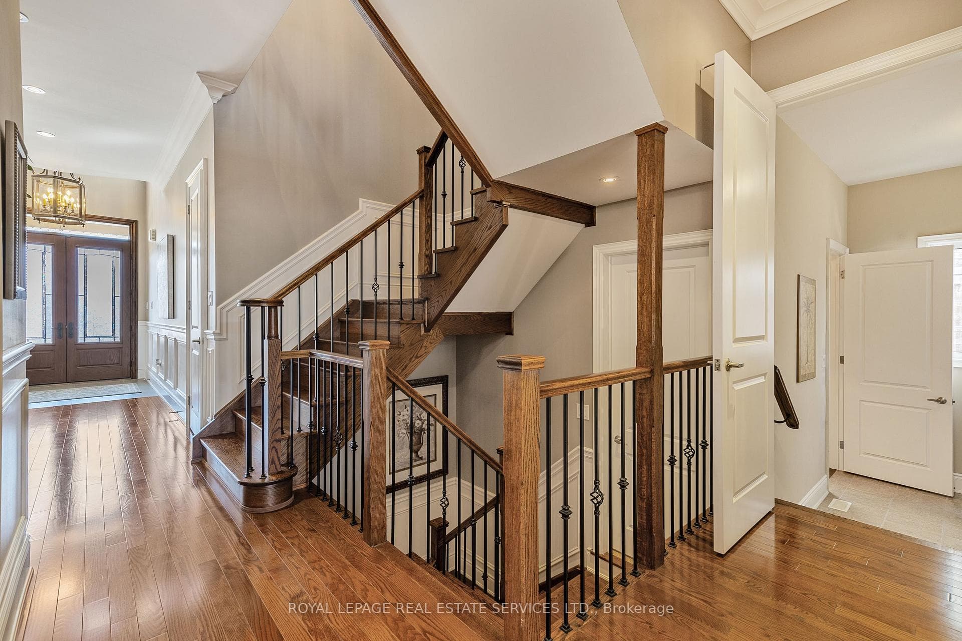 Elegant Hardwood Staircases w/Wrought Iron Pickets
