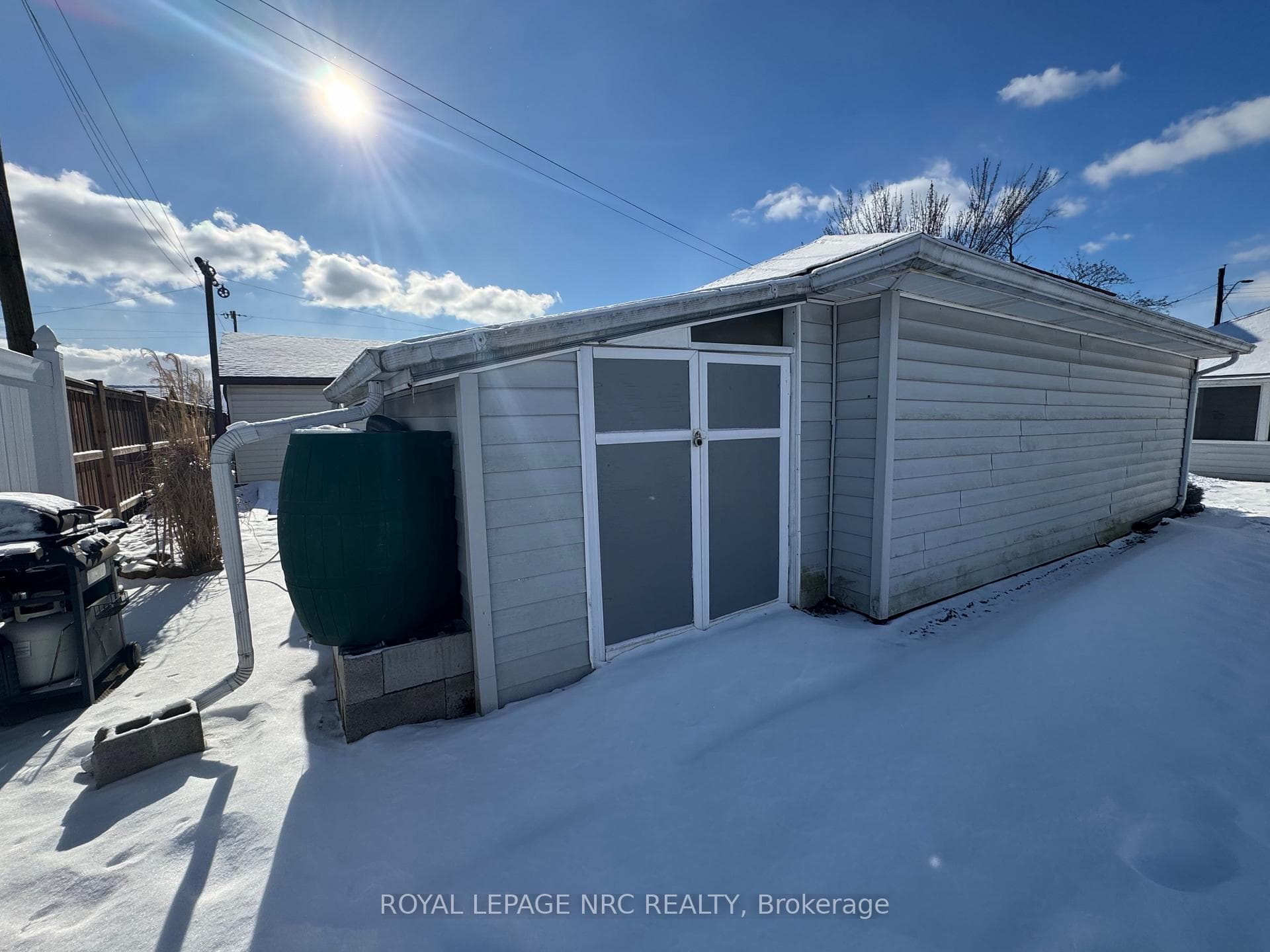 Extended garage and attached sheds