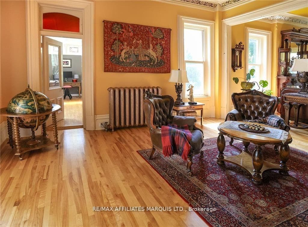Library Connects To Sunroom and To Living Area