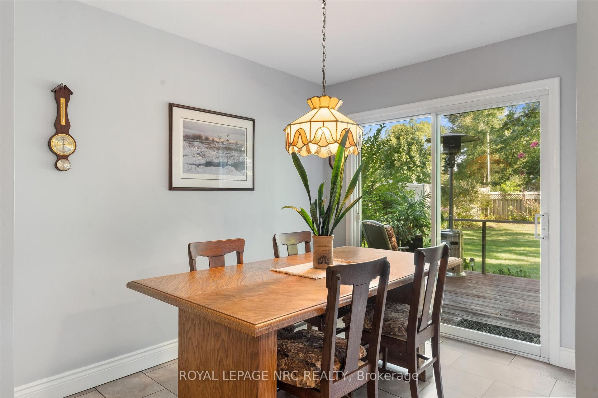 Lots of tablespace with view of the deck & garde
