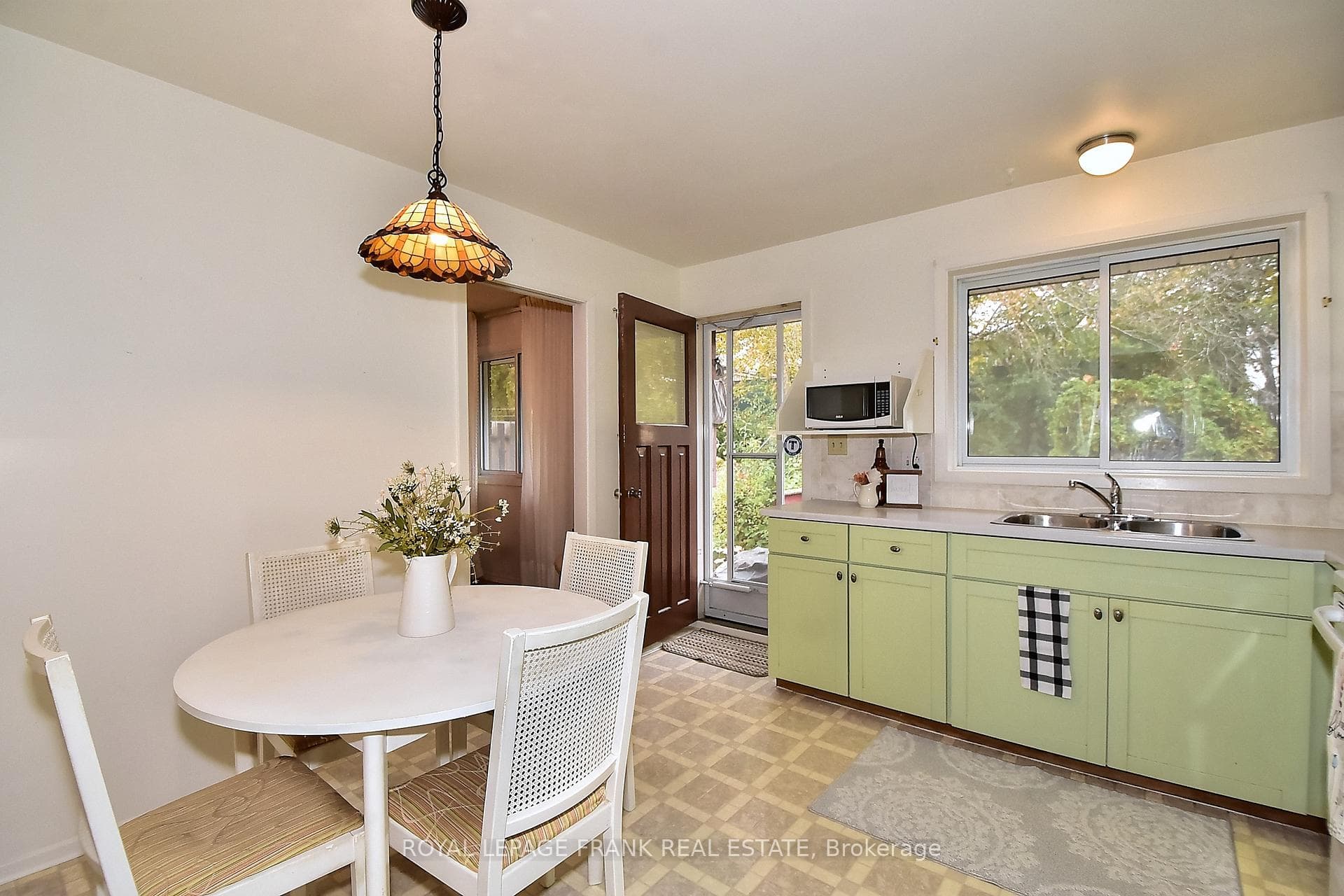 Walk-out from Kitchen to deck and backyard