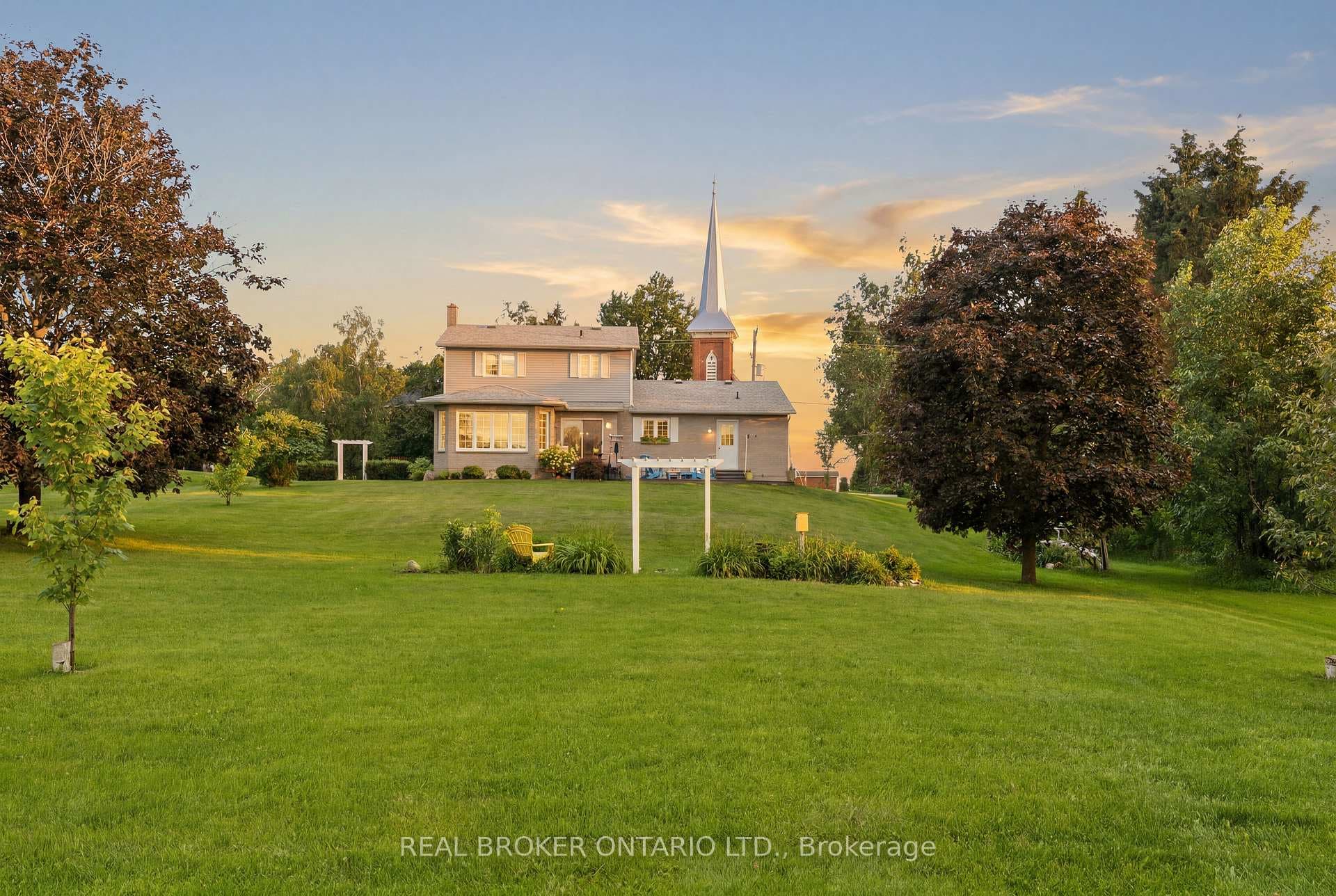 beautiful spacious backyard with mature trees