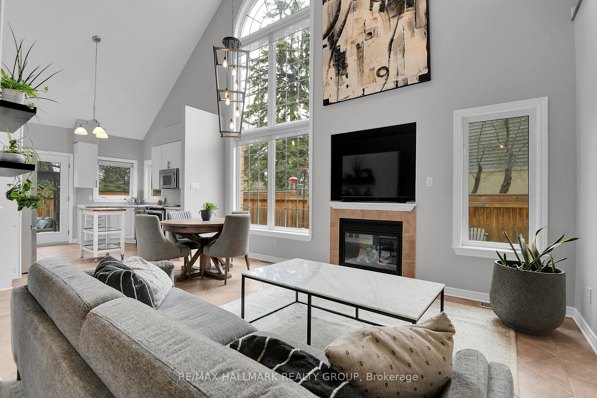 LIVING/DINING | dramatic vaulted ceiling, gas f/p