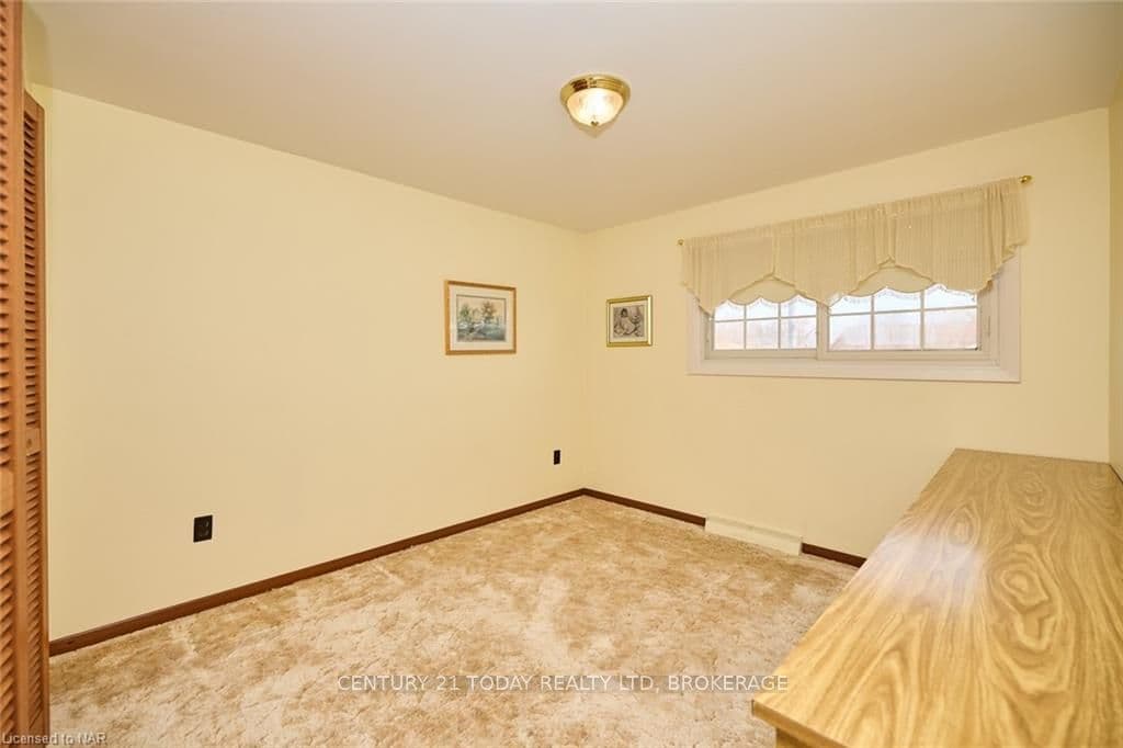 bedroom 2---hardwood under carpet