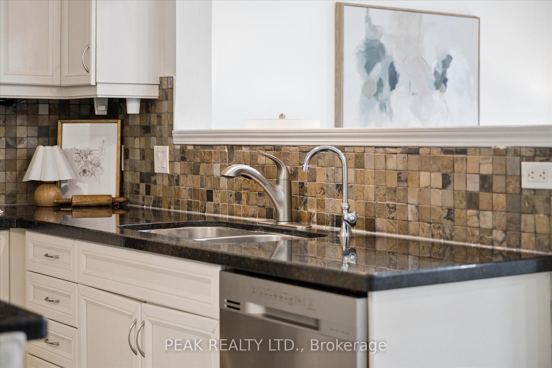 Black granite counters & stone backsplash