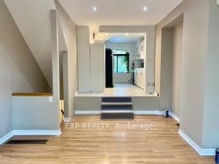 Large Living/Dining Room with Access to Backyard