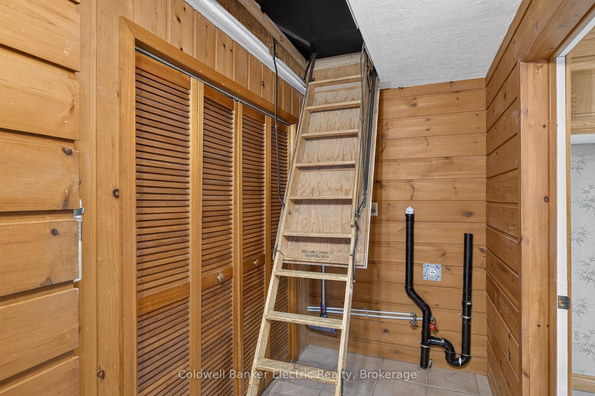 Pull down attic stairs for extra storage