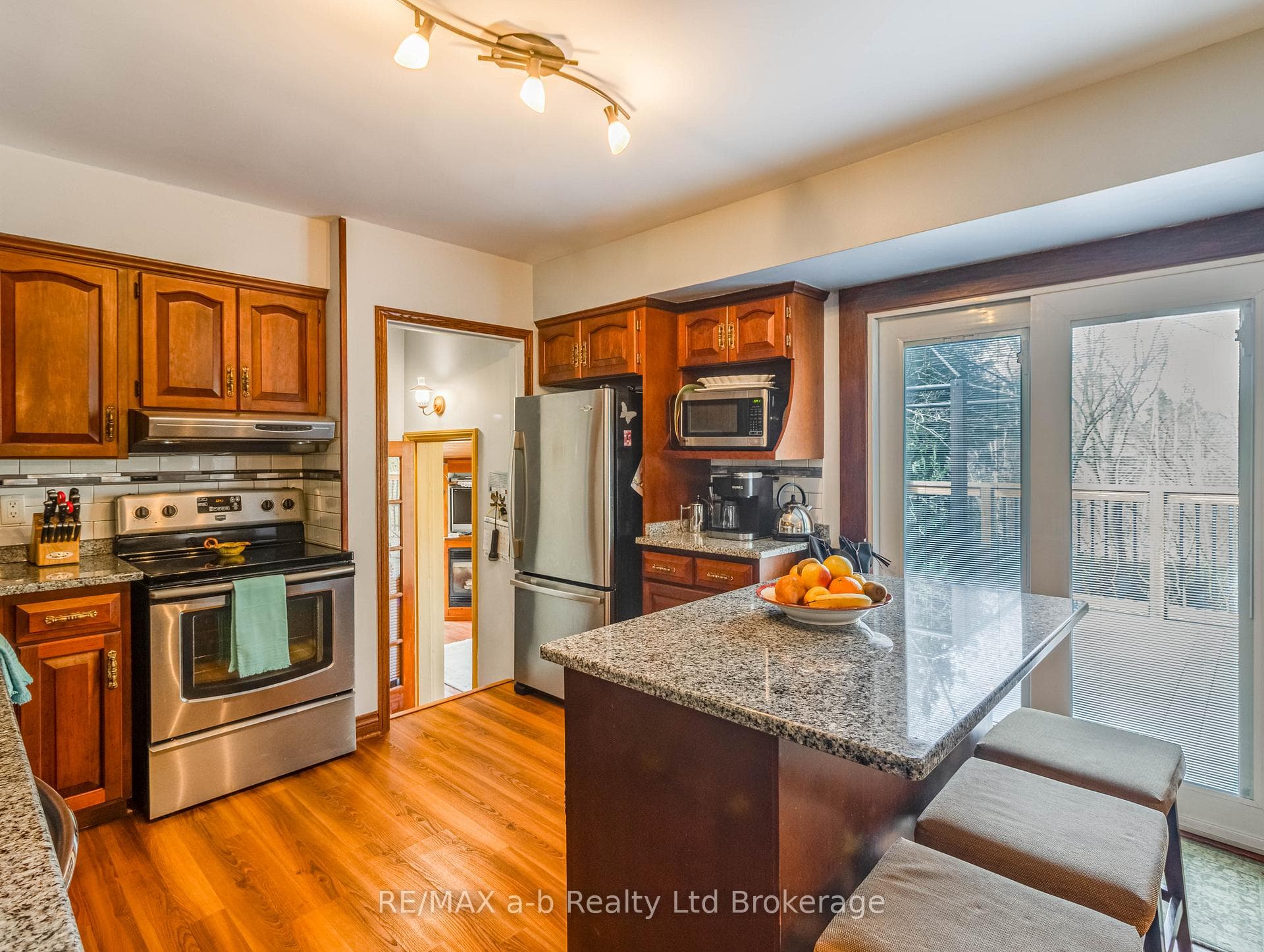 Main kitchen with patio doors to the deck