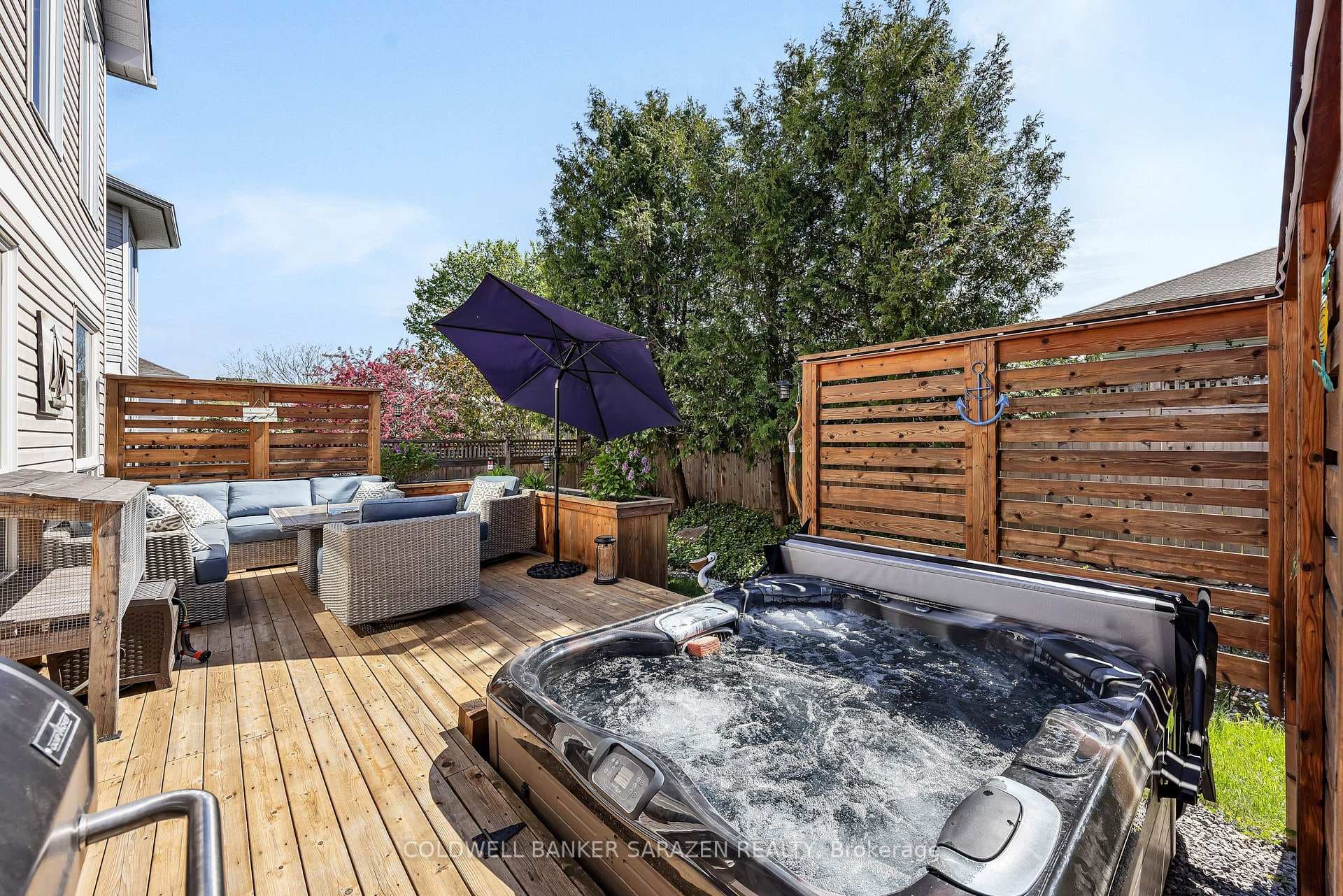Large deck with hot tub - & privacy screens