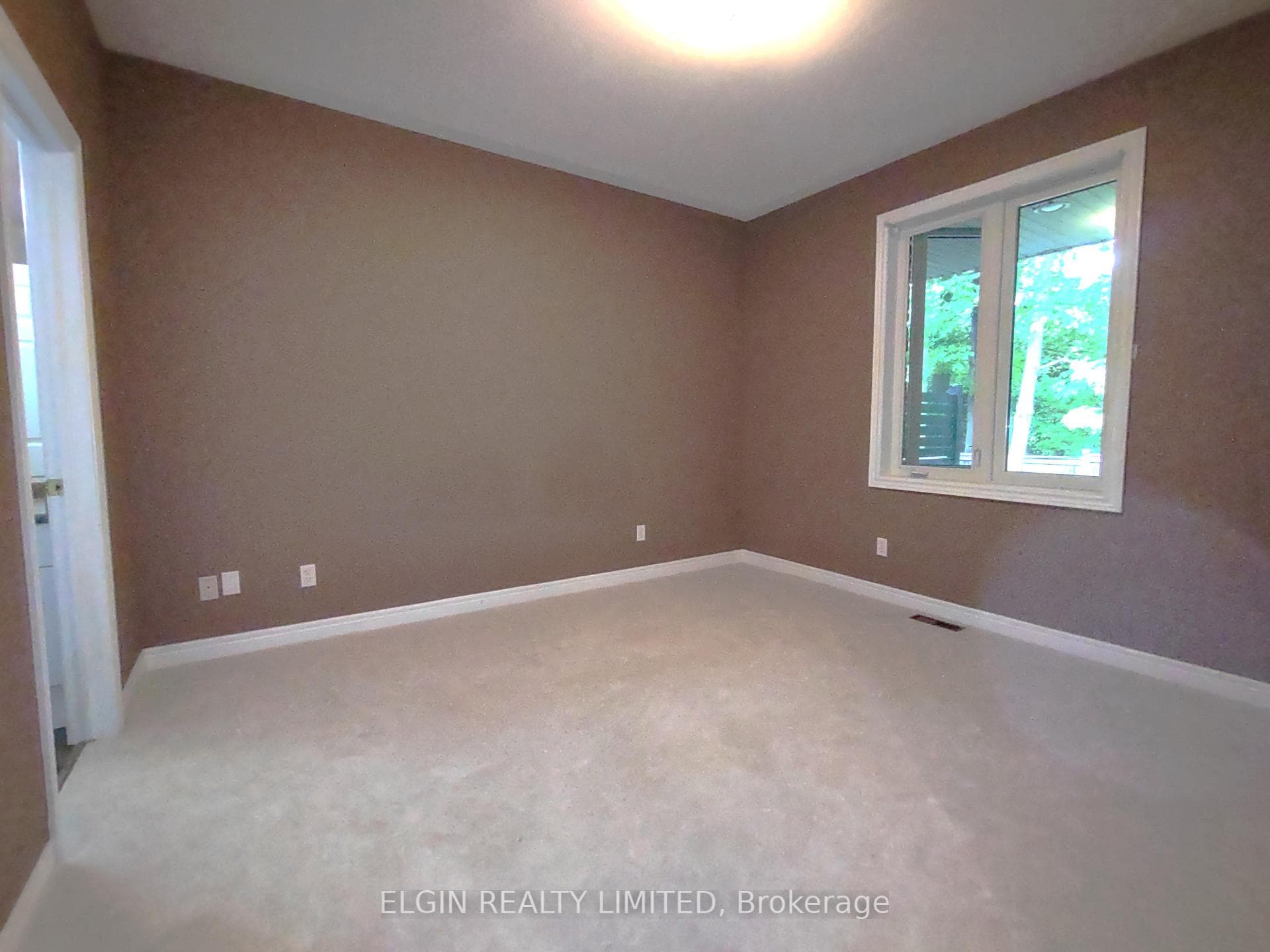 Master Bedroom--window onto covered deck