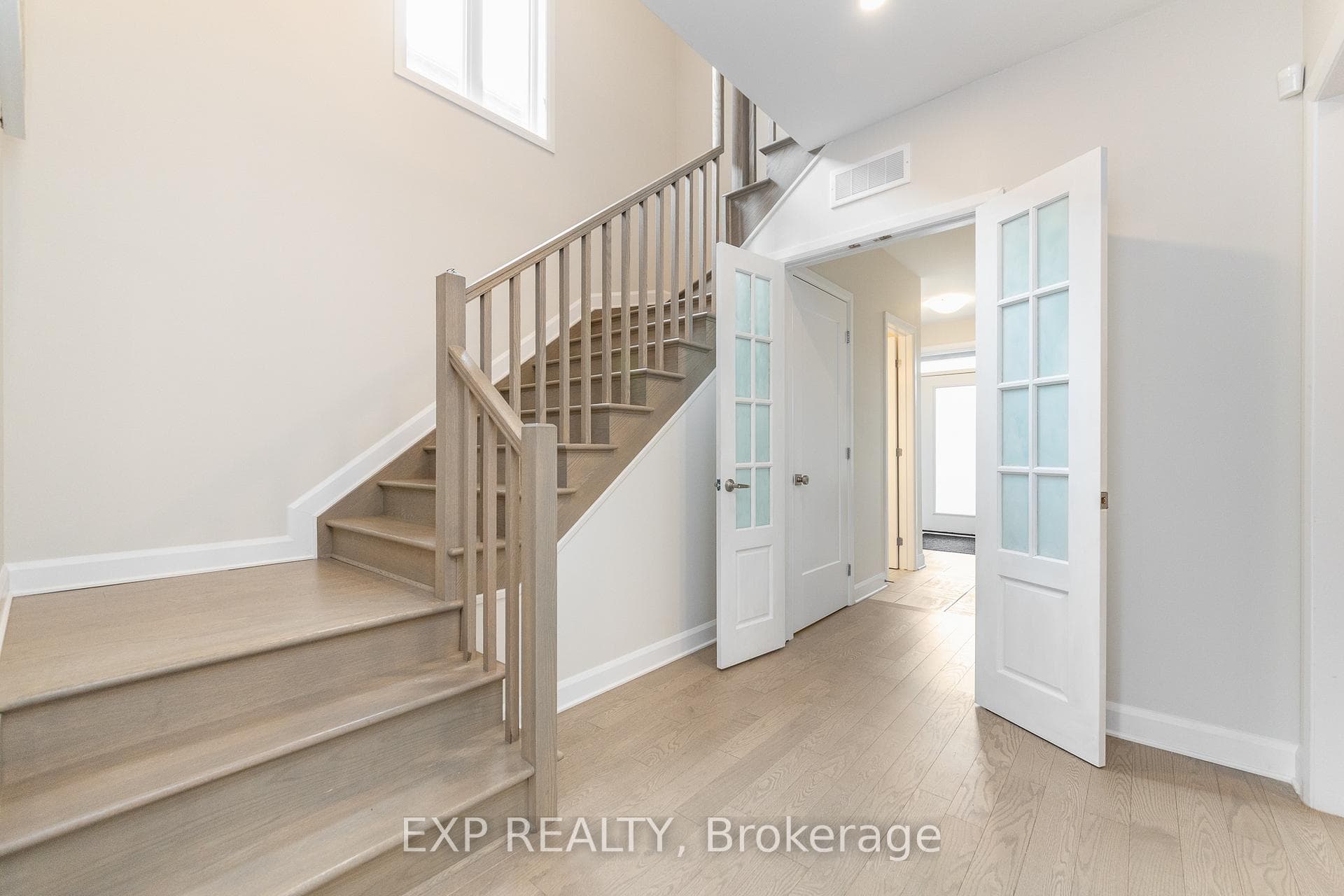 Extra Wide Stairs & Open to Below w/French Doors