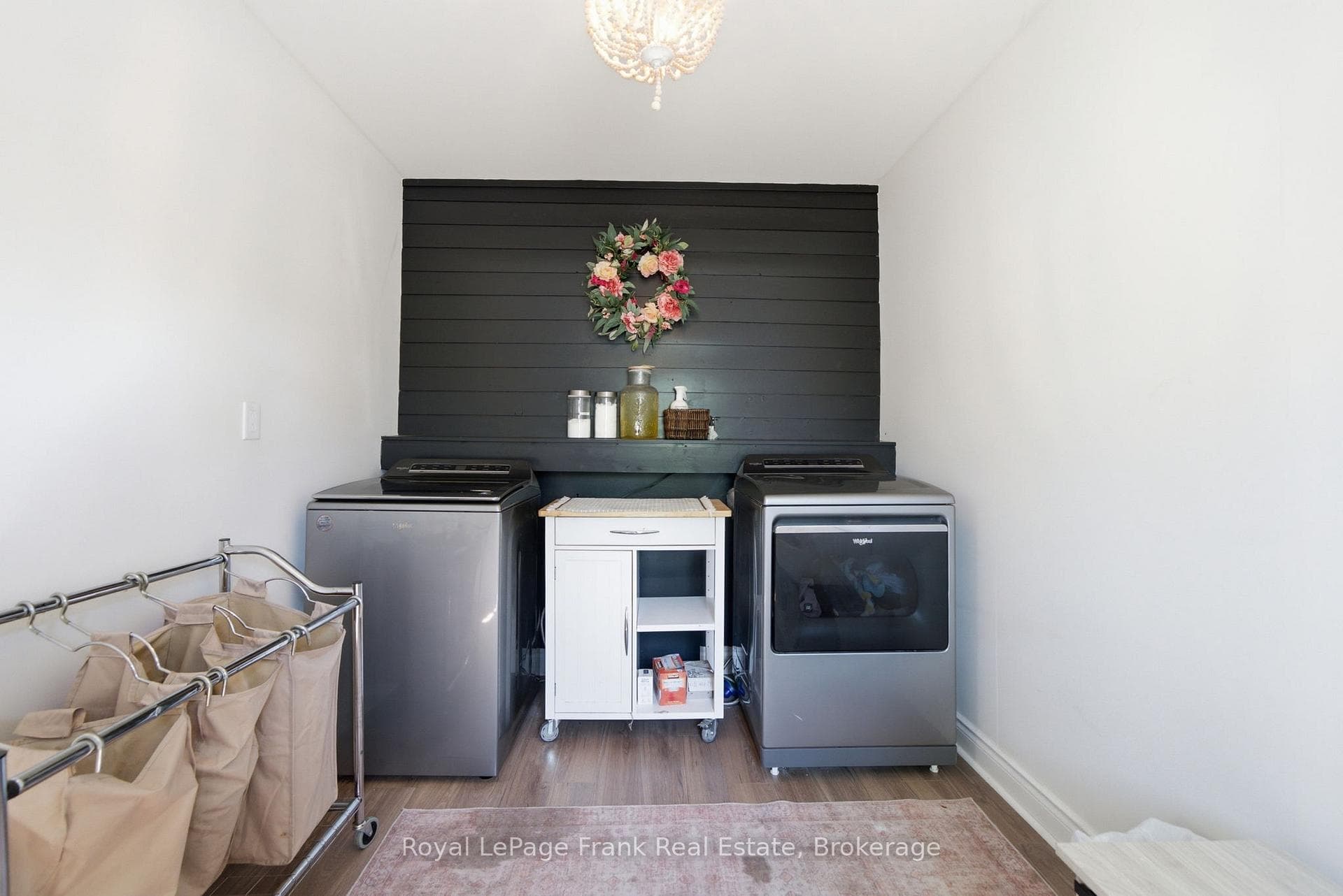 Laundry Room with entrance door to side deck