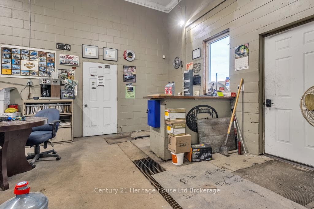 Office area and entrance to attached apartment