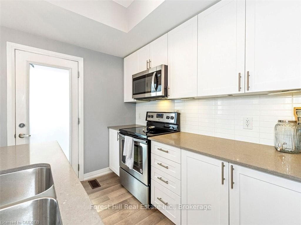 1210 MAIN ST E Street Unit 104 photo 13