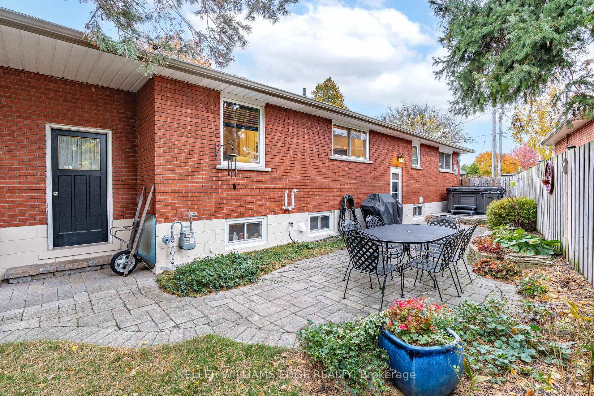 Stone patio and backyard garage access