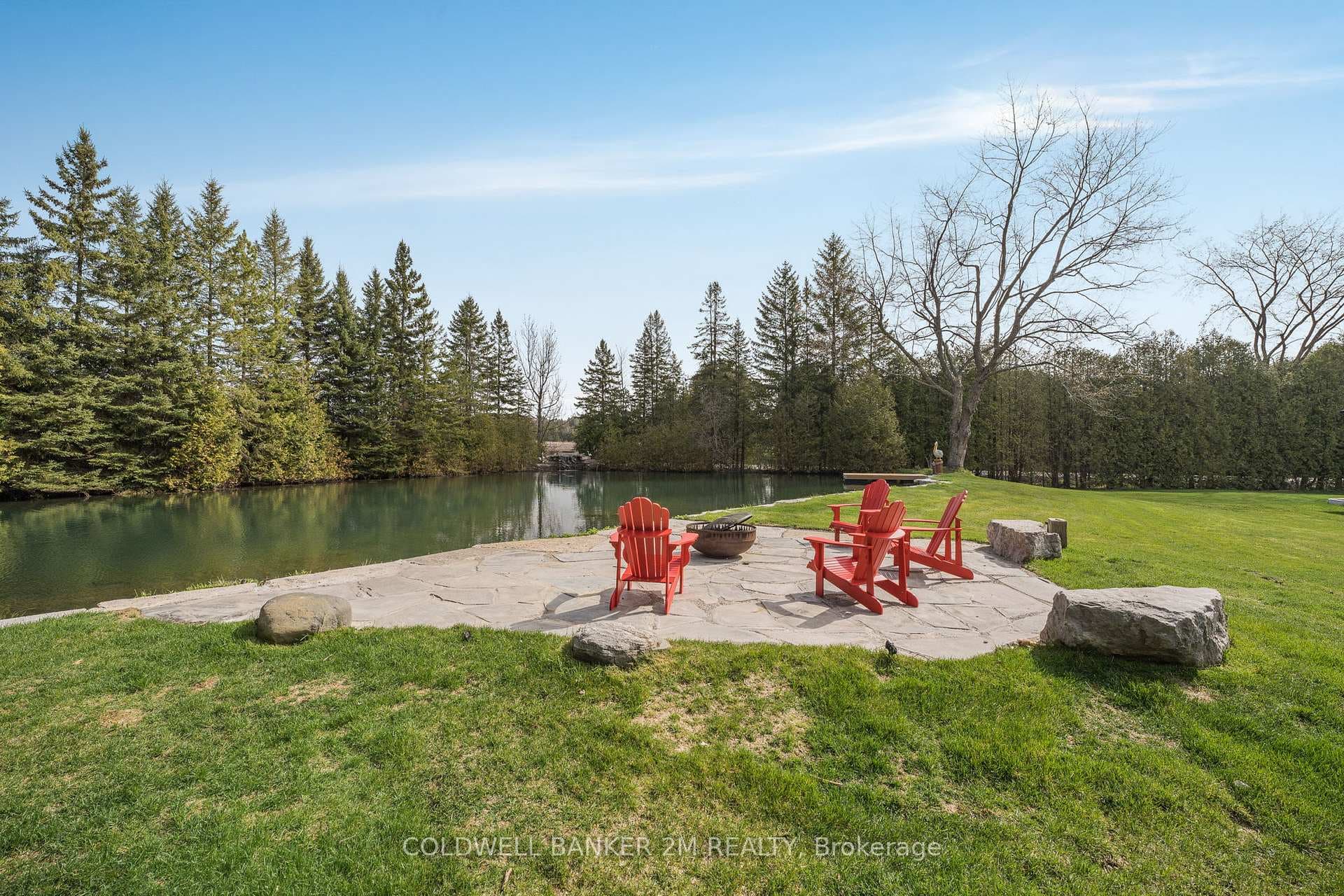 Granite Fireplace Pit Beside the Pond.