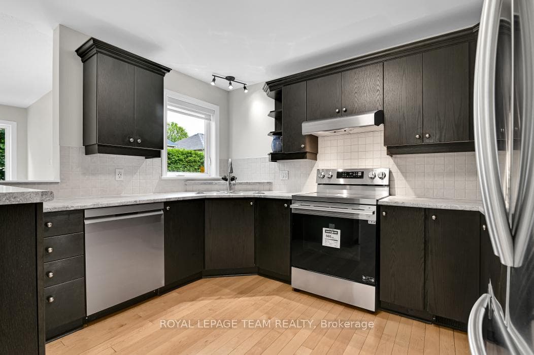 Kitchen with new dishwasher & stove