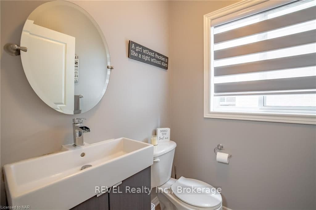 There is a main floor two-piece bathroom, perfect