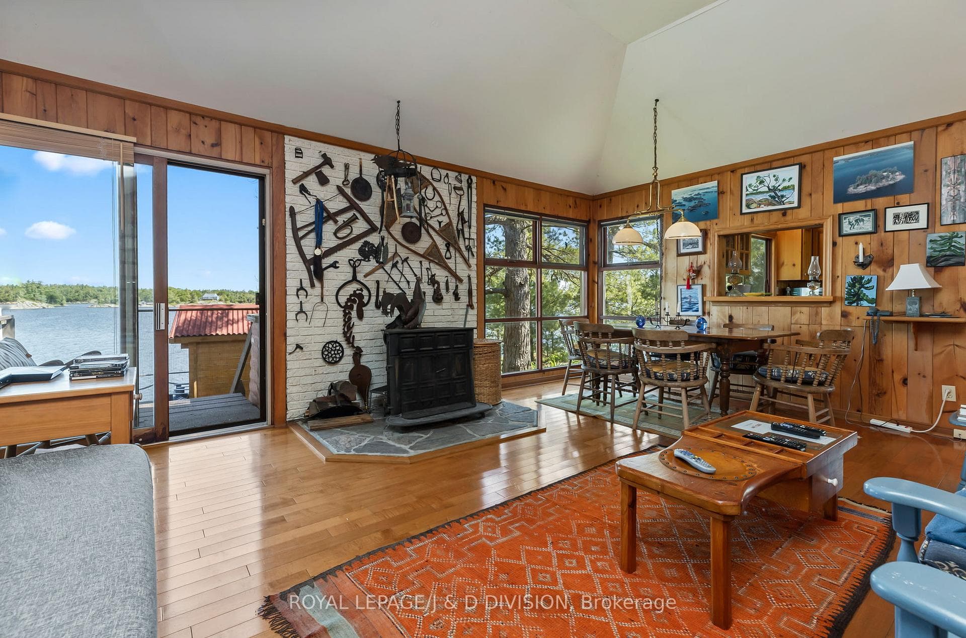 View of entrance, wood stove, dining room