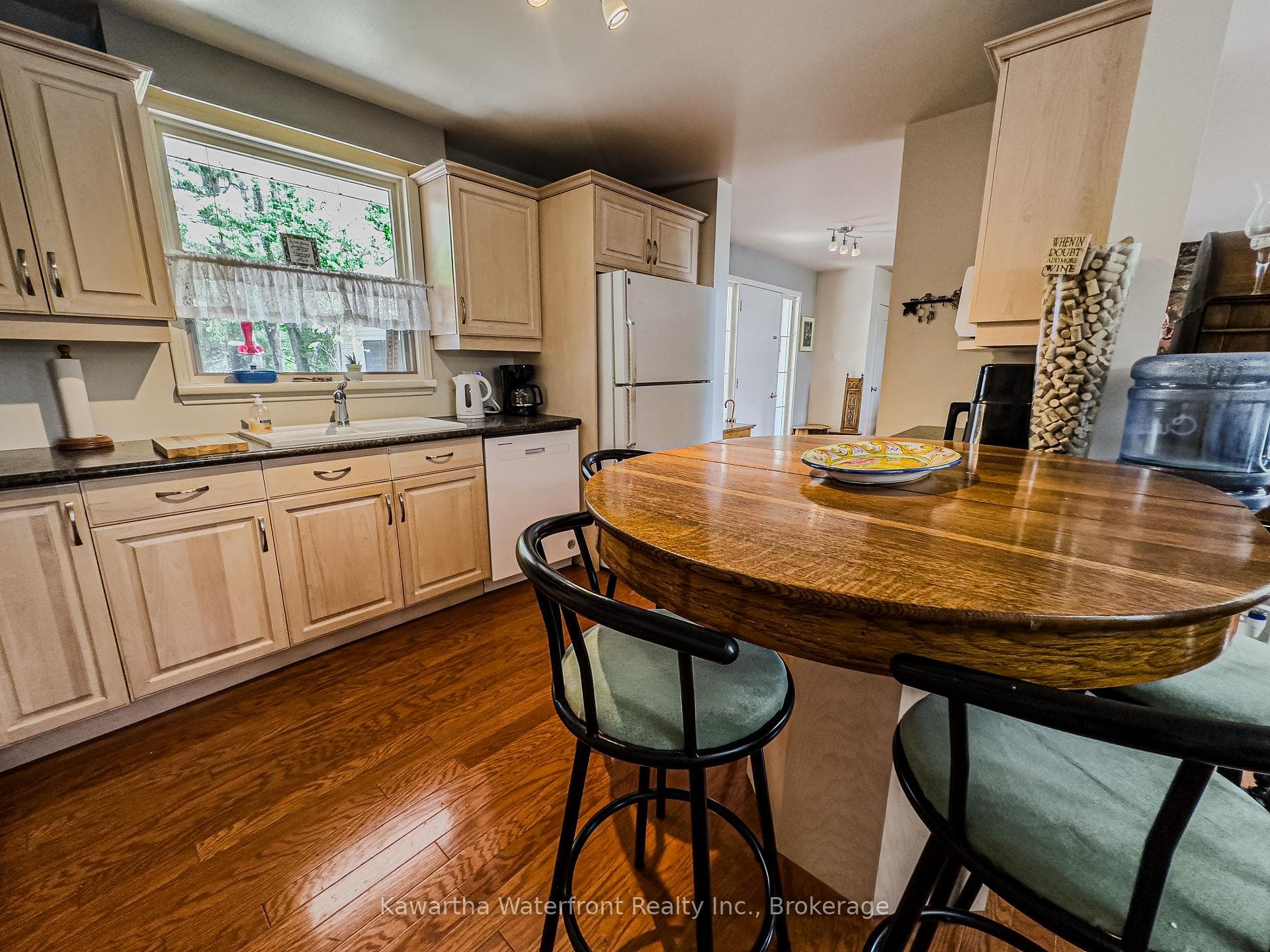 kitchen with door to double car garage attached