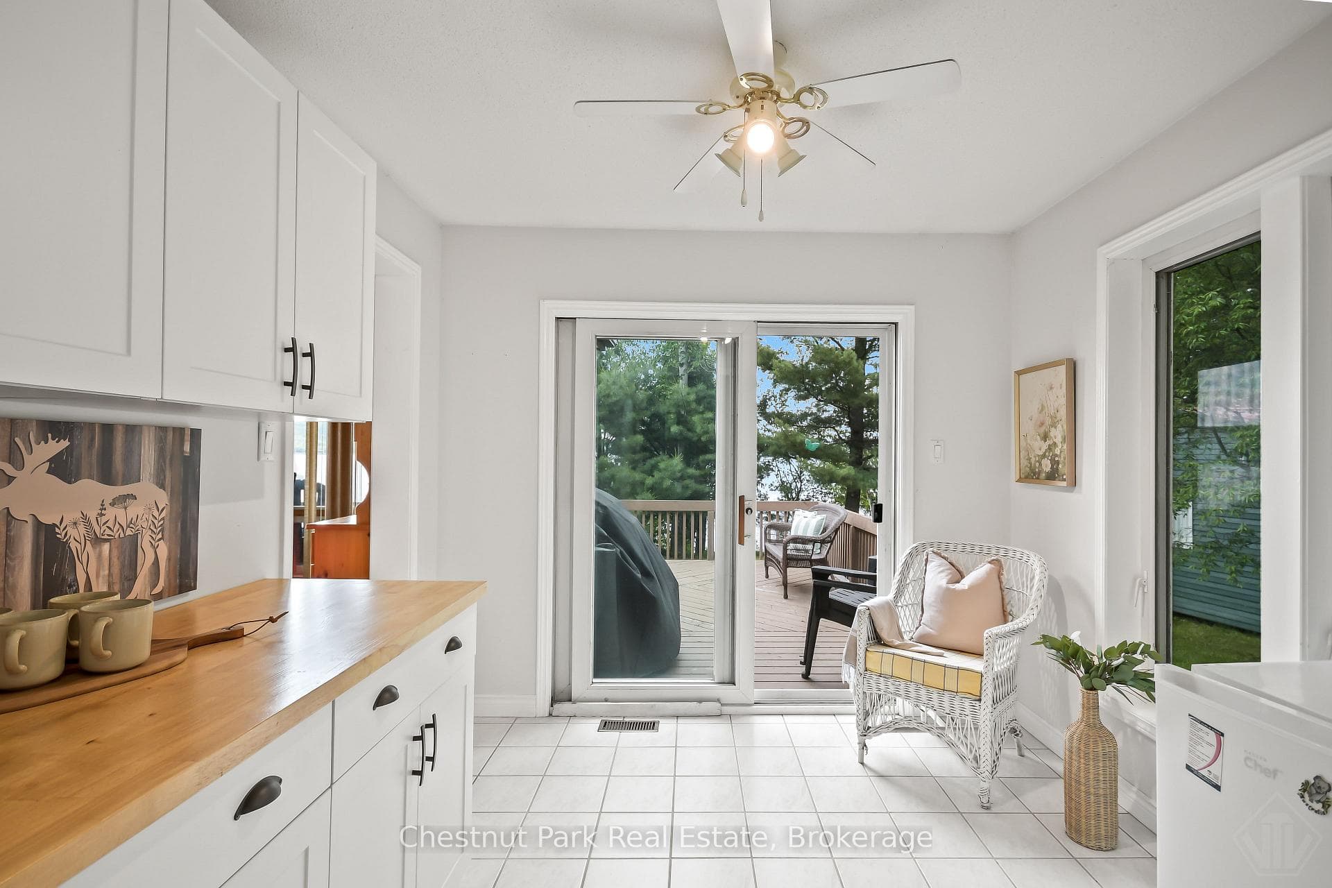 sunroom with access to lakeside deck