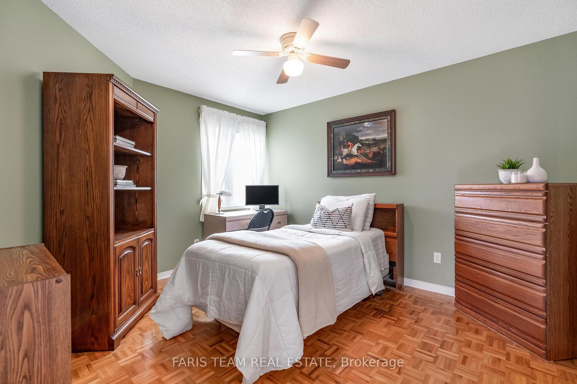 Bedroom featuring ceiling fan and closet