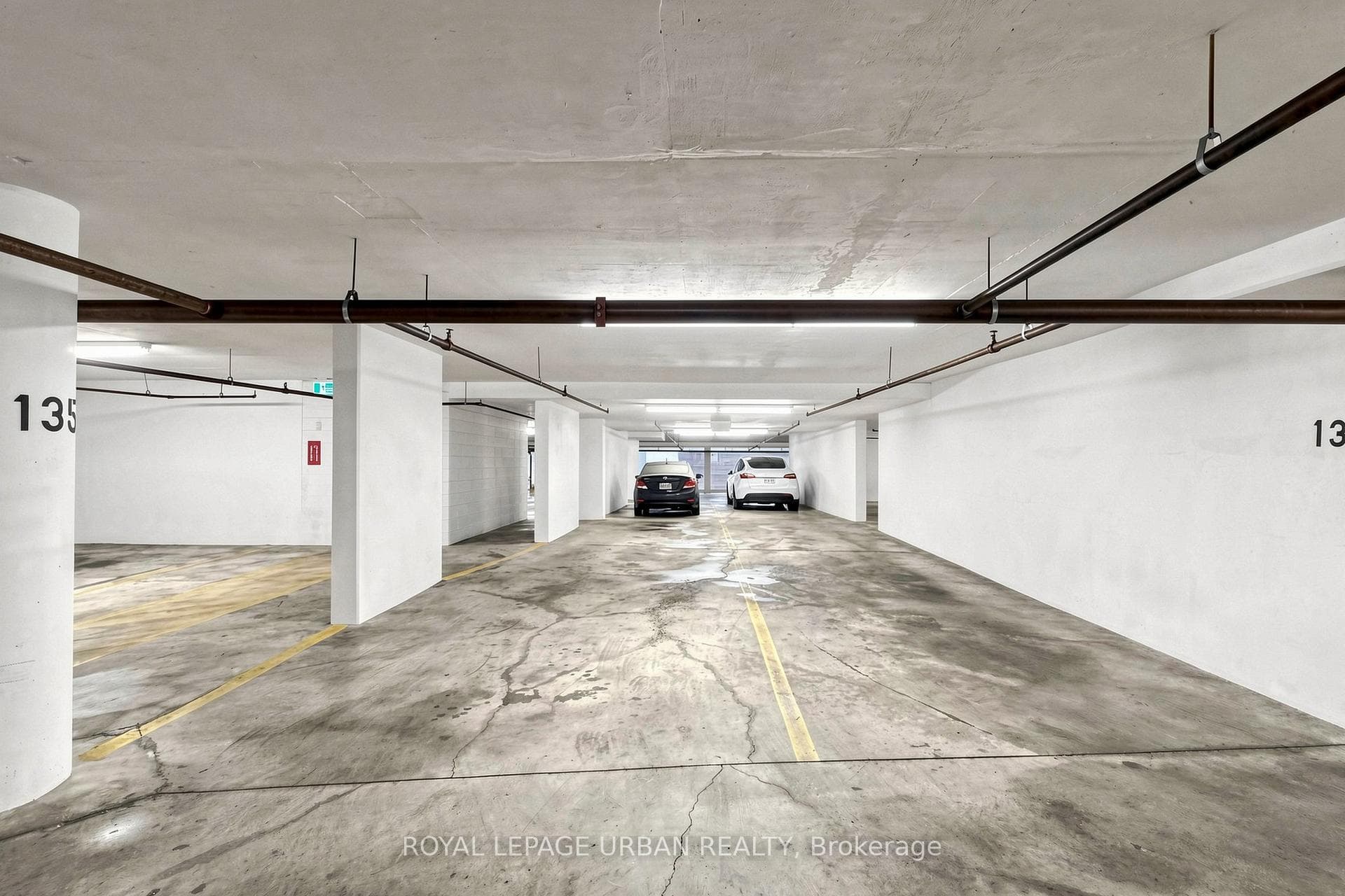 Parking #135 is Tandem (Fits 2 Cars)
