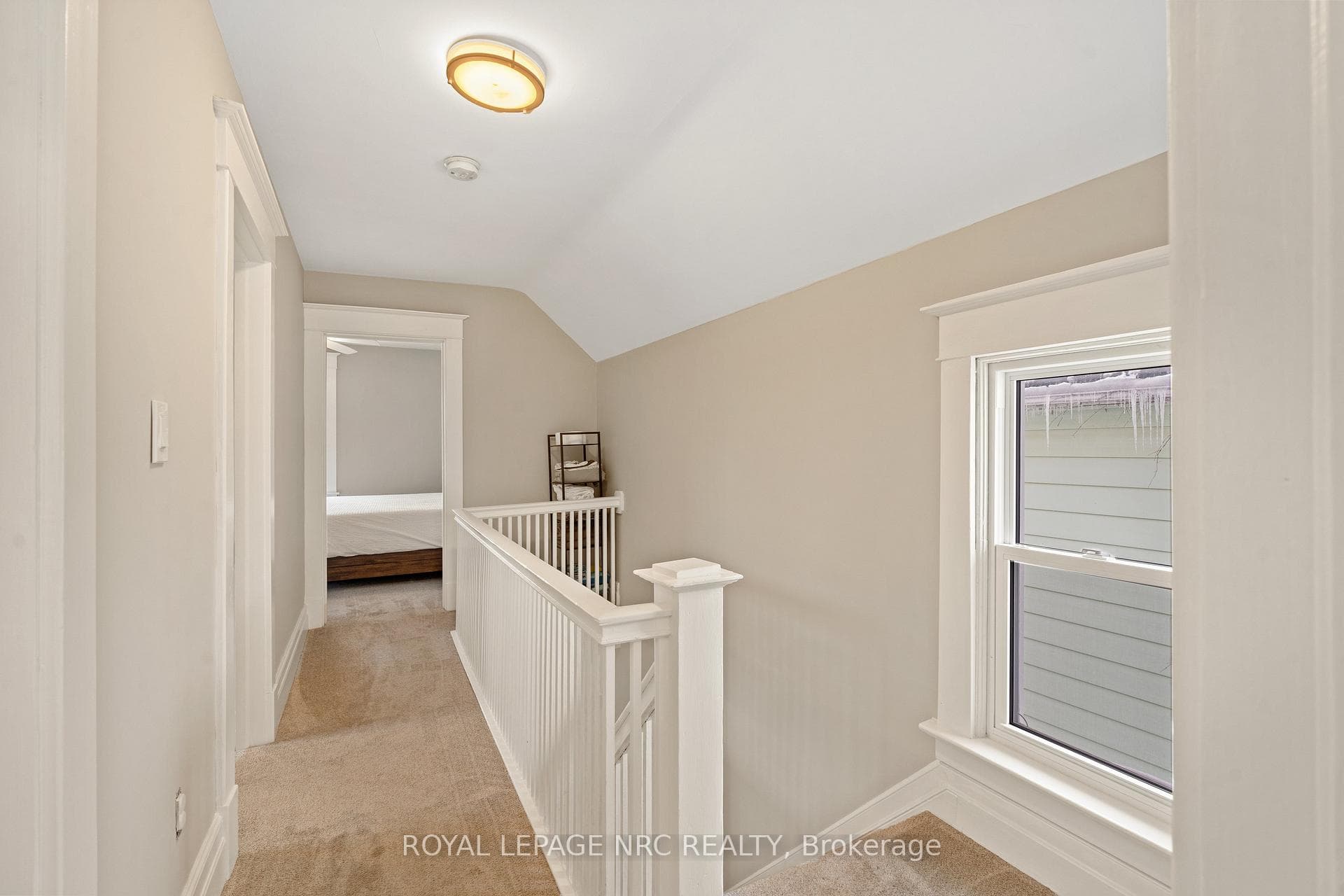 Abundant natural light at top of the stairs