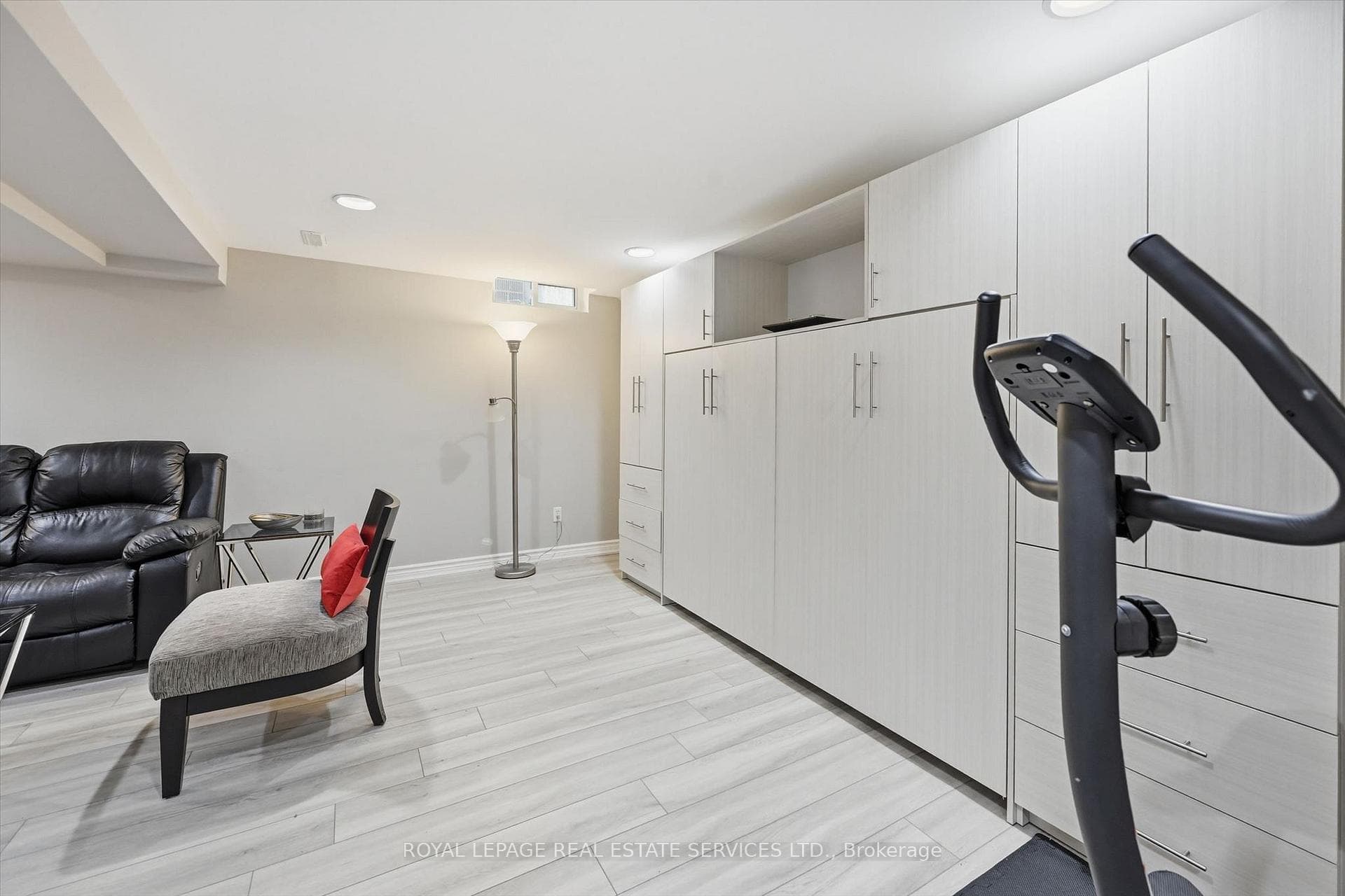 Built-in Murphy Bed Framed by Custom Cabinetry