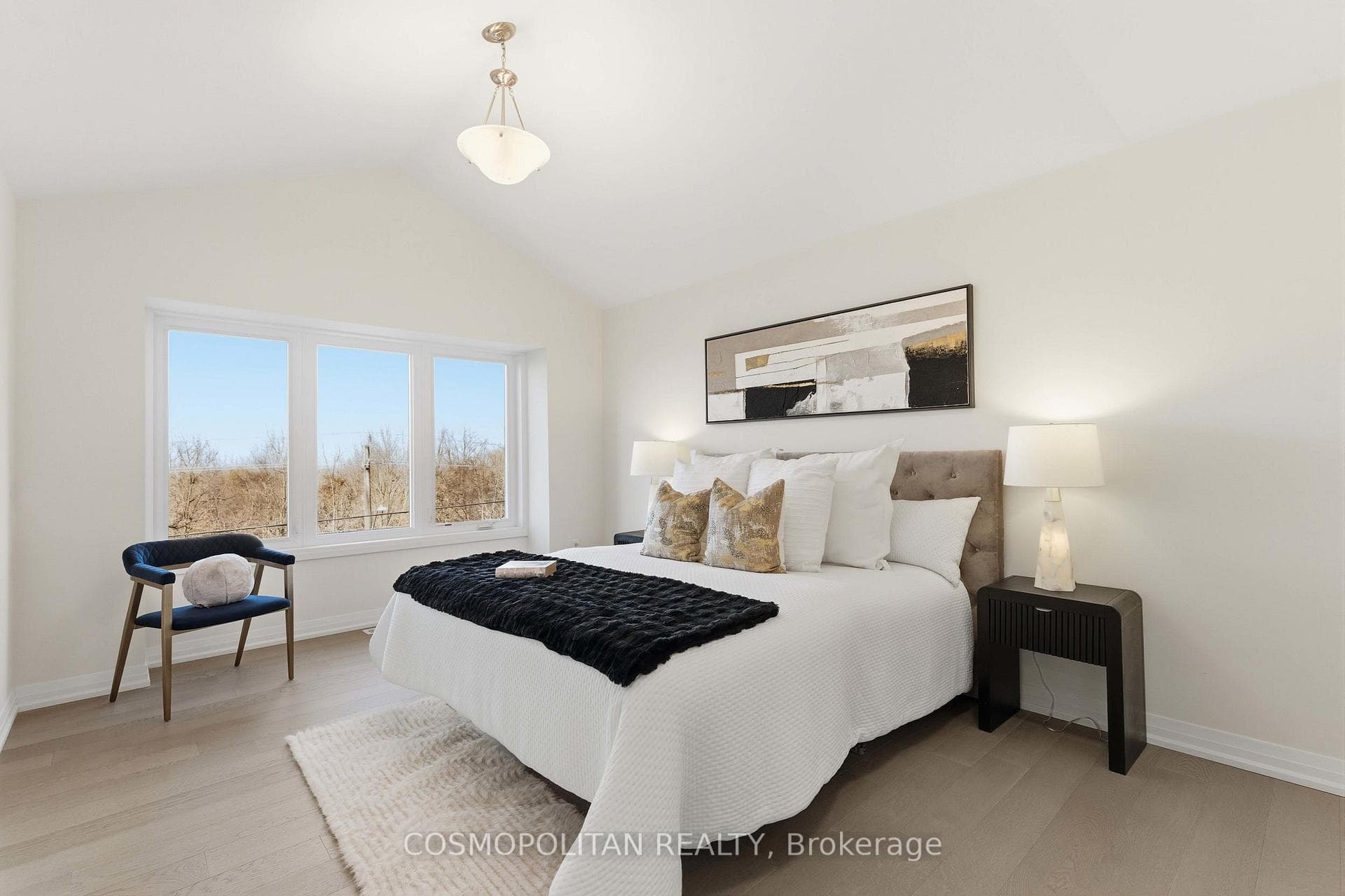 primary suite-cathedral ceilings and views of park