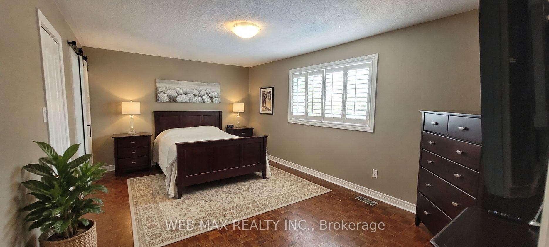 prime bedroom with walk in closets, ensuite bath