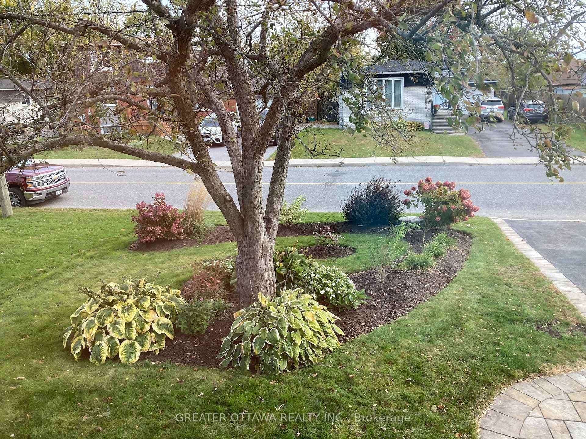 great landscaping including interlock walkways.