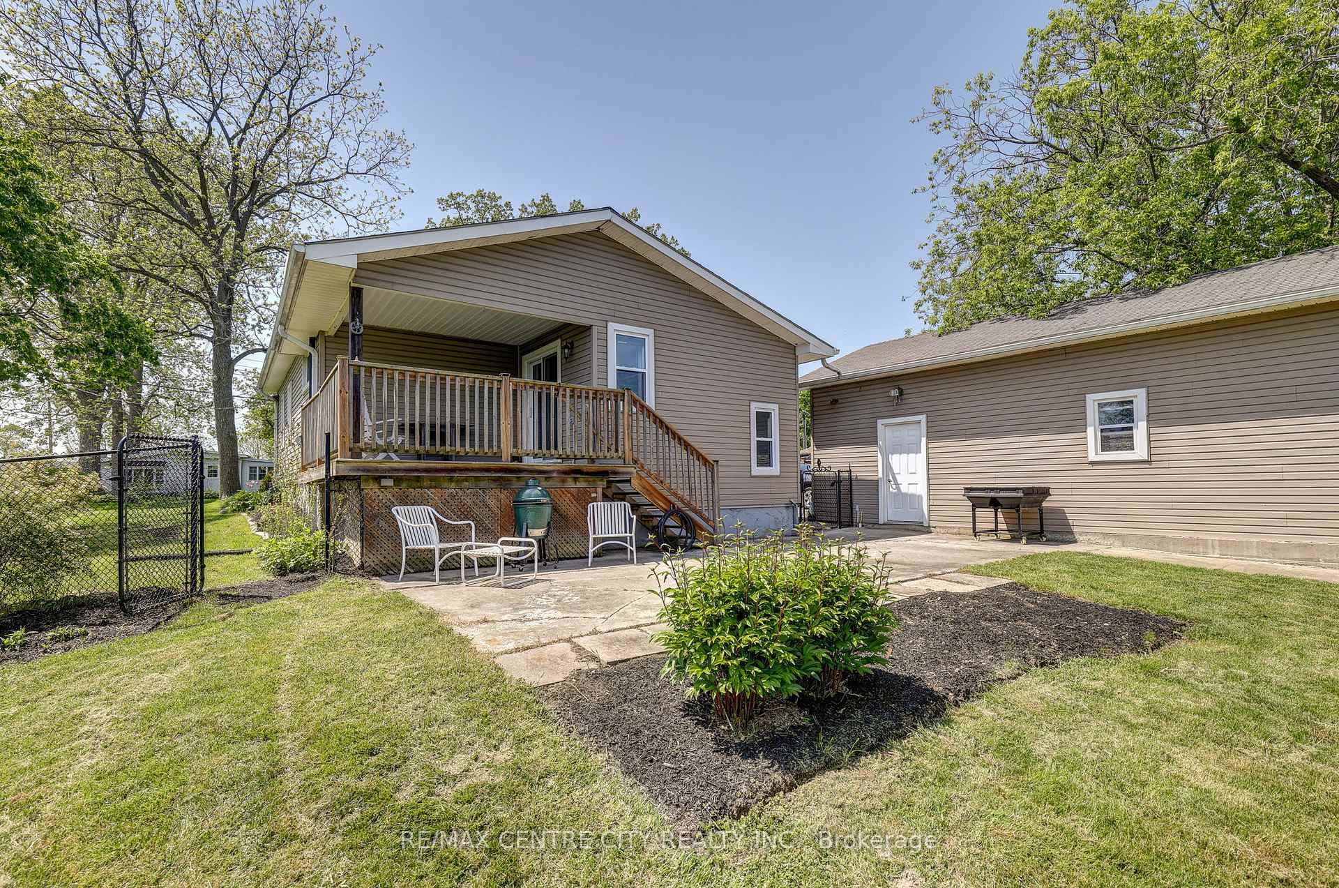 covered deck, open patio, fenced yard