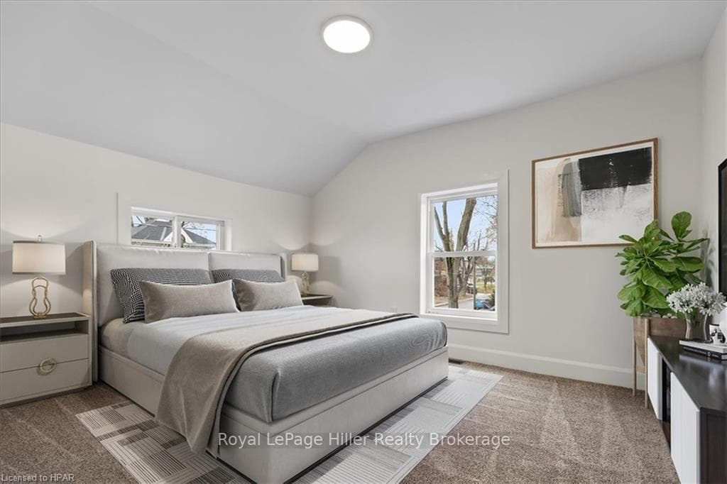 Upstairs Bedroom with carpet flooring