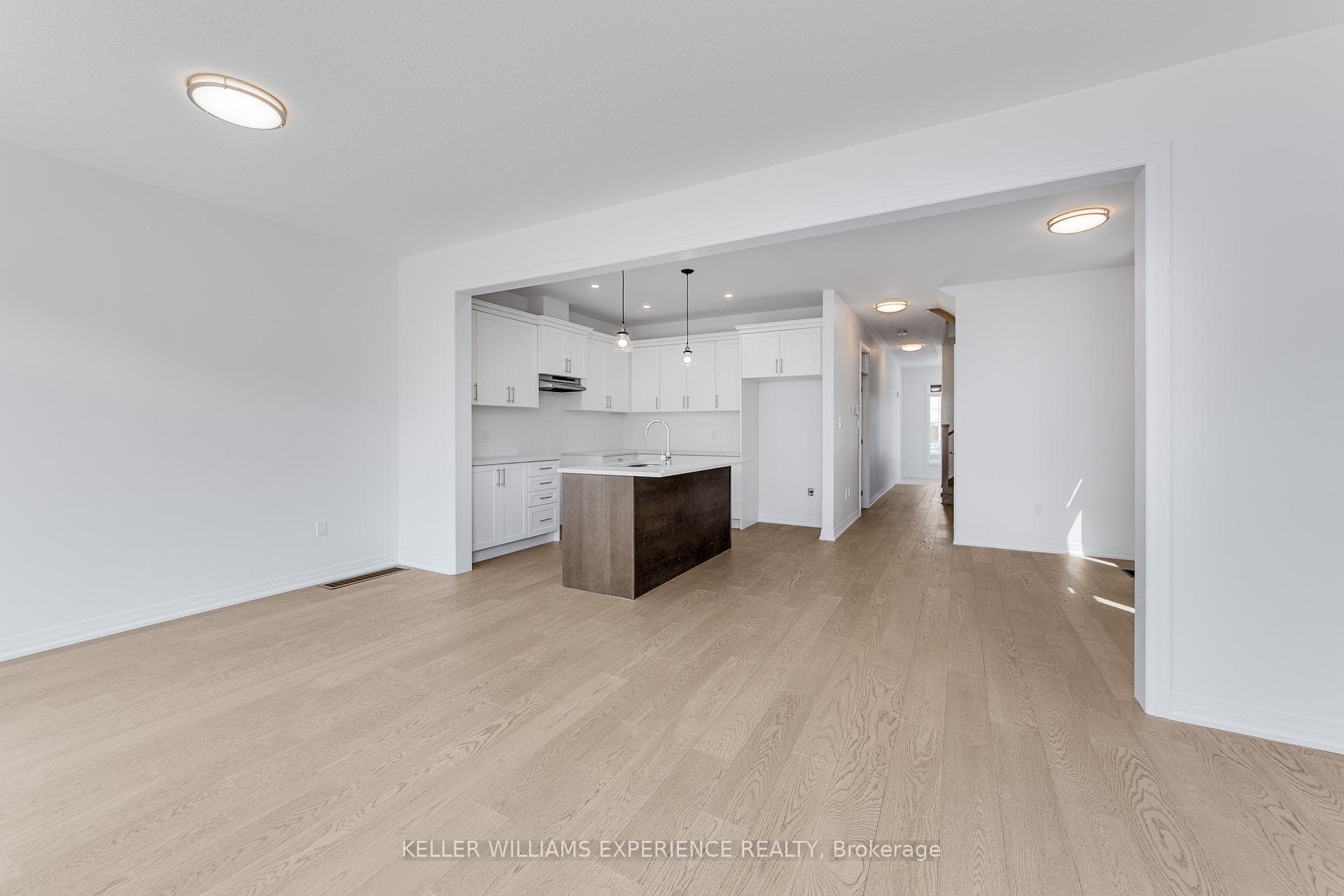Great Room to kitchen with Hardwood