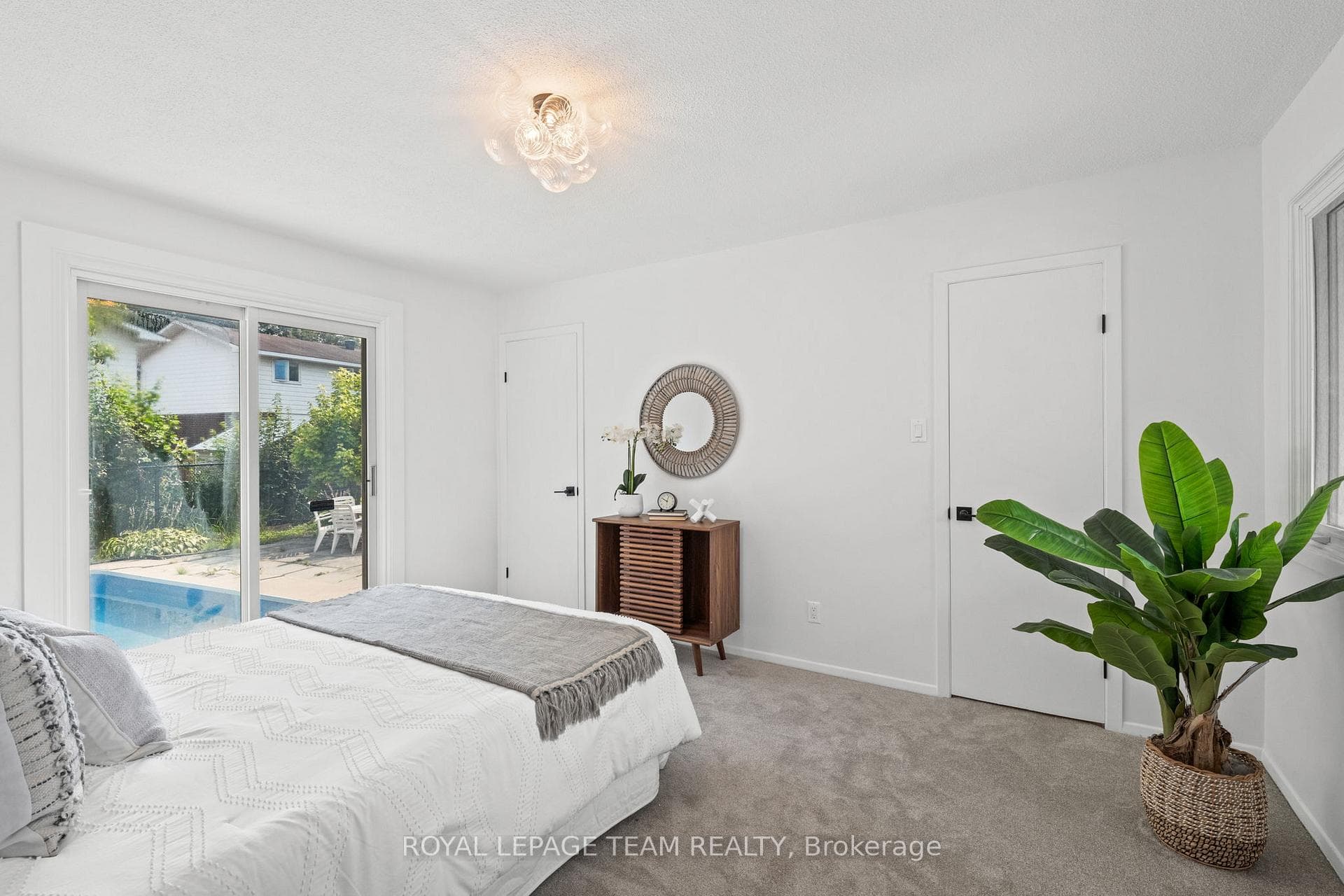 Primary Bedroom with w/o to the pool!