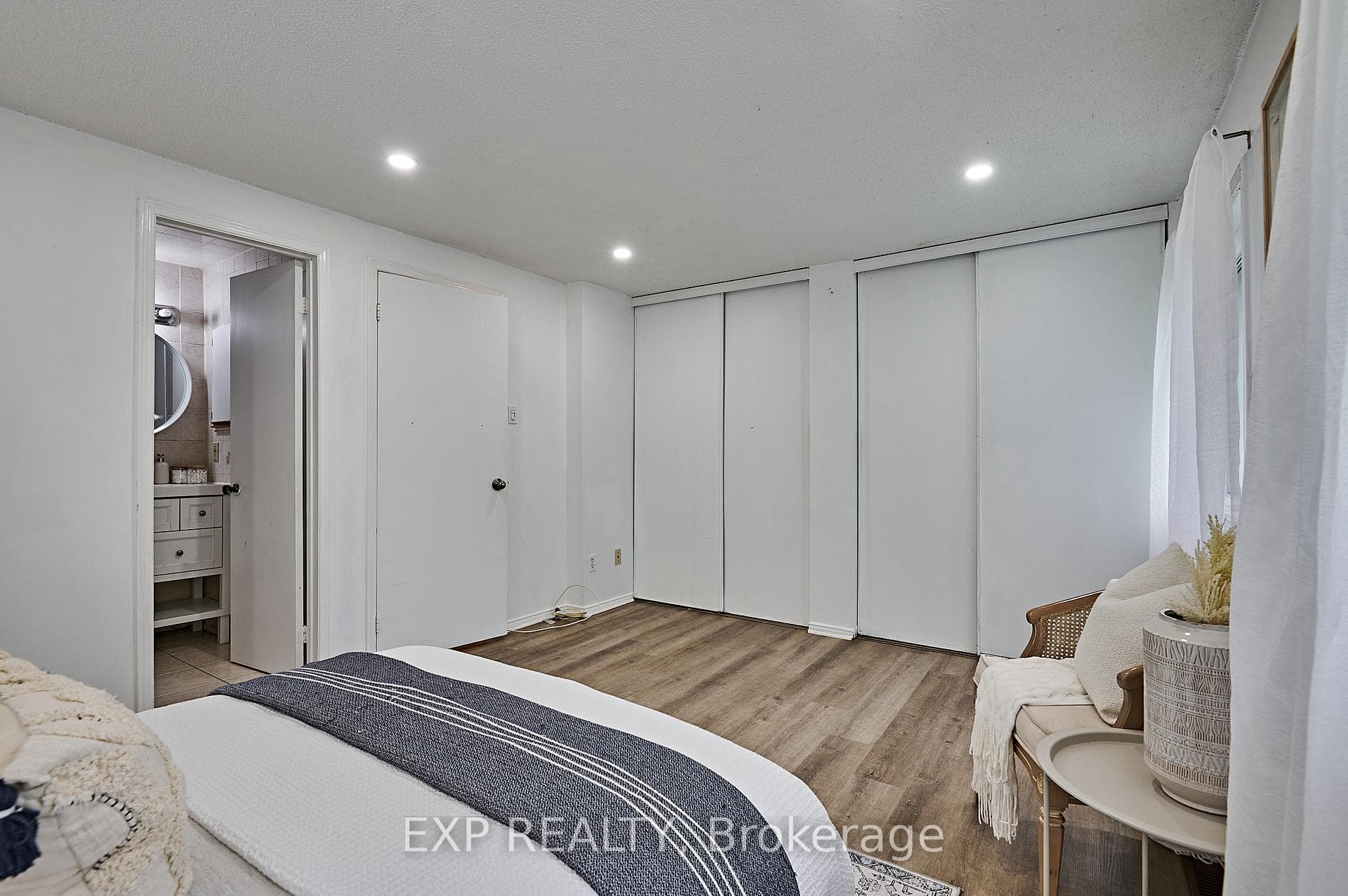 Primary Bedroom with semi-ensuite & large closets