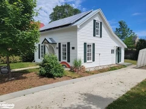View of home's exterior with solar panels