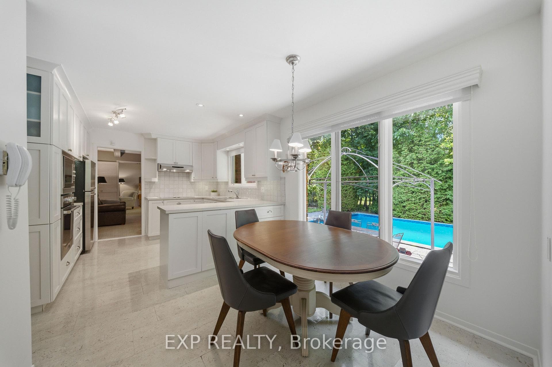 Spacious breakfast nook with backyard view