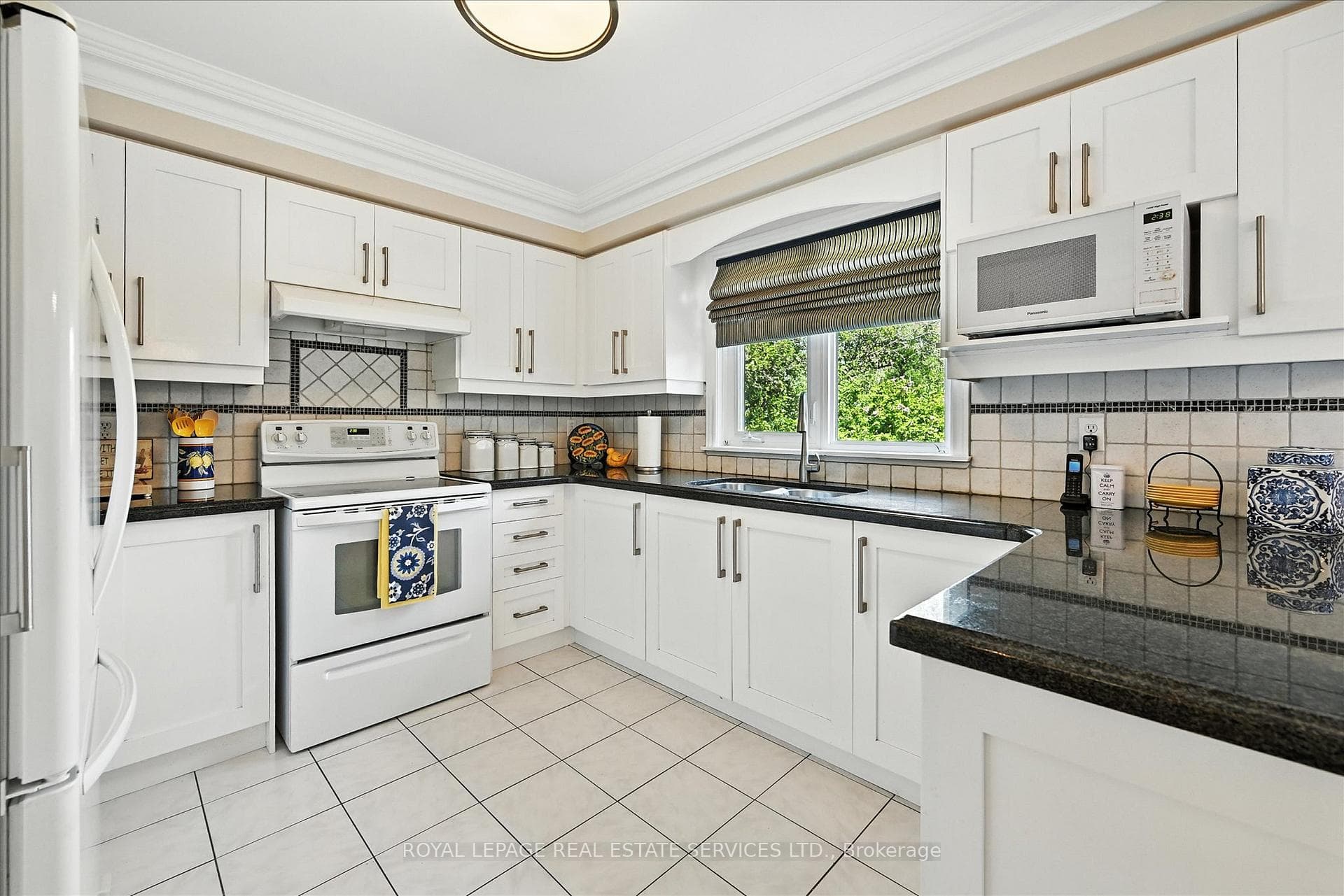 Renovated Kitchen Showcases Granite Countertops