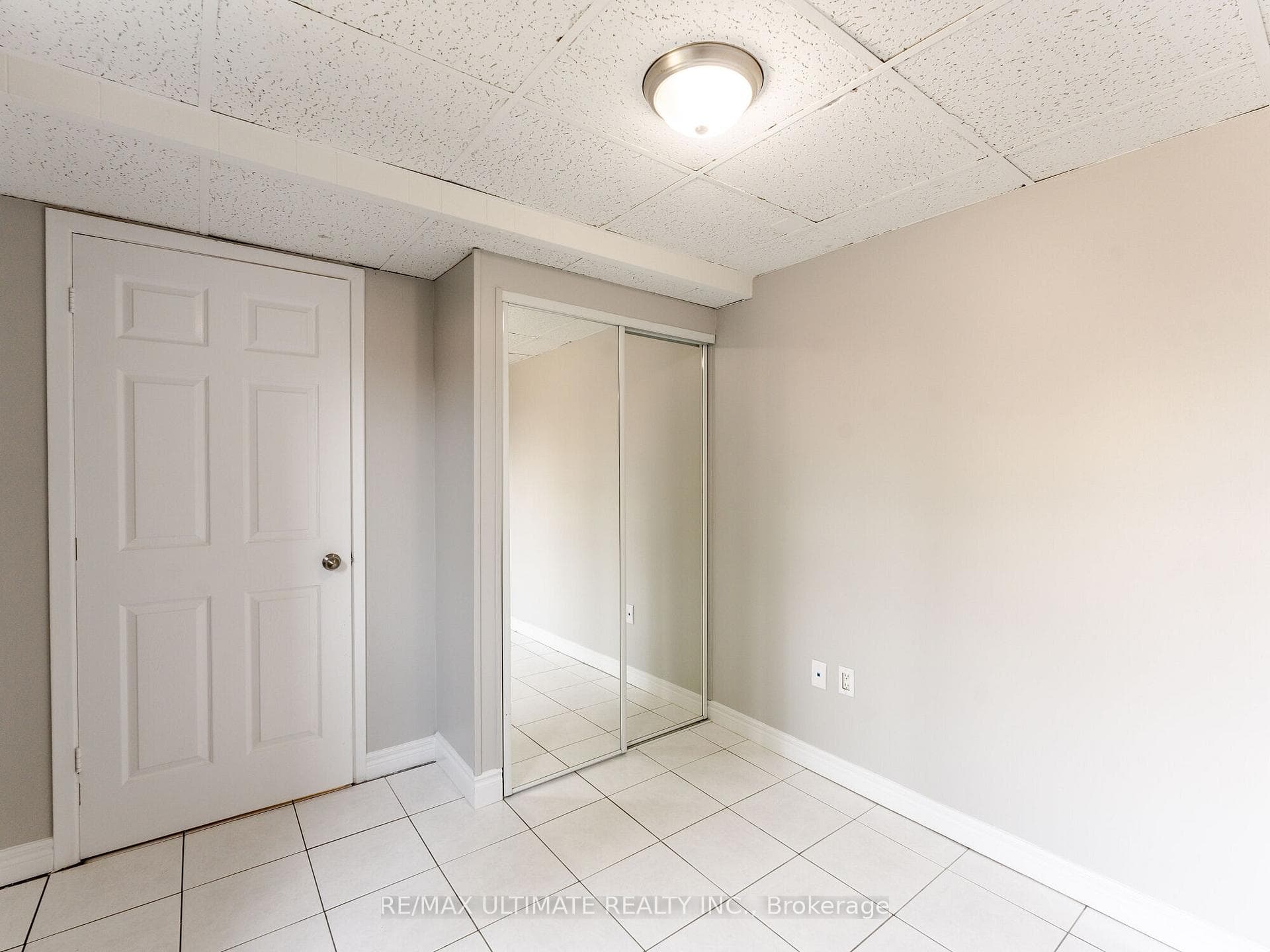 Double Mirrored Closet in Bedroom