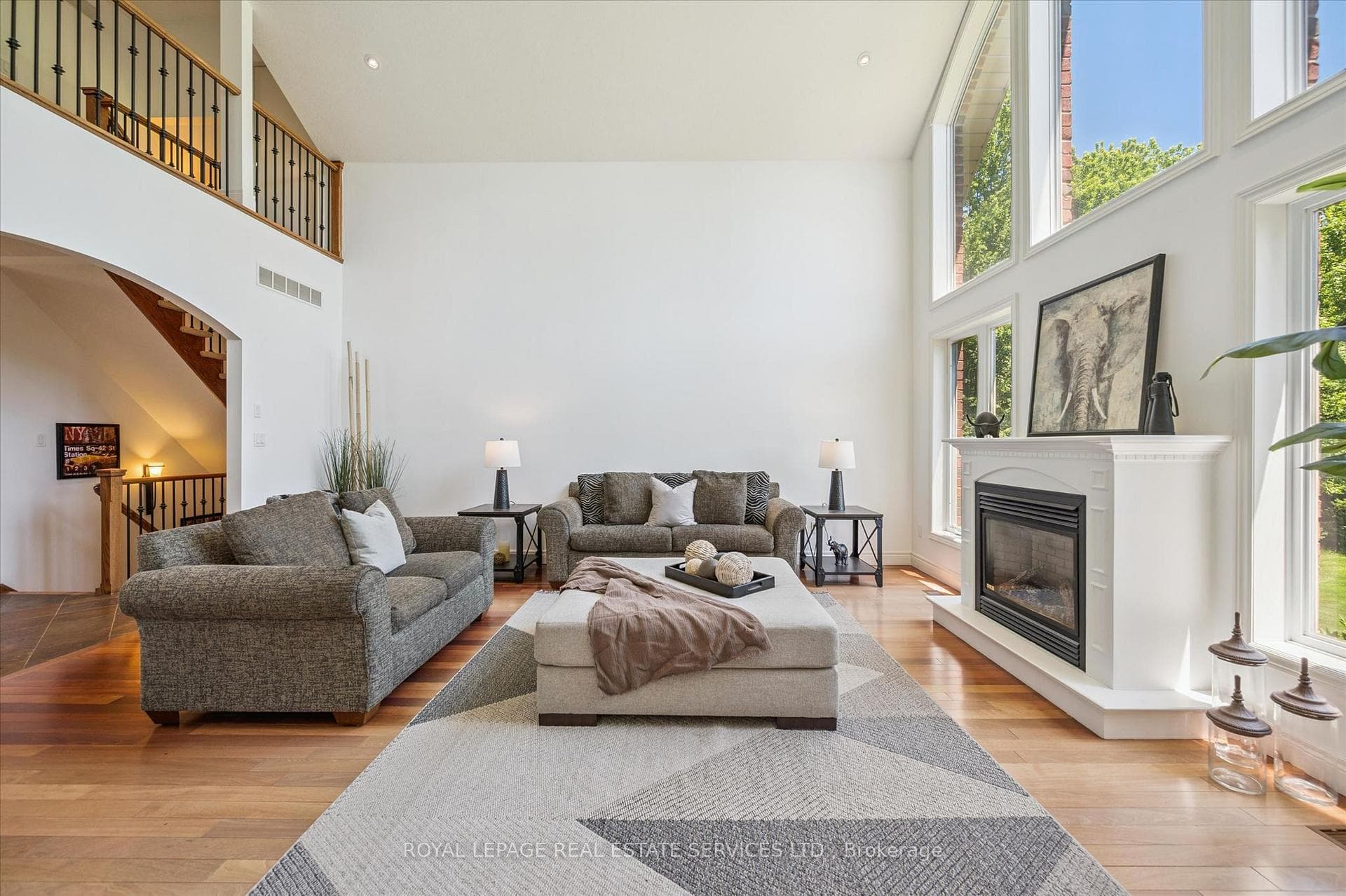 Living Room, Open to Above, with a Gas Fireplace